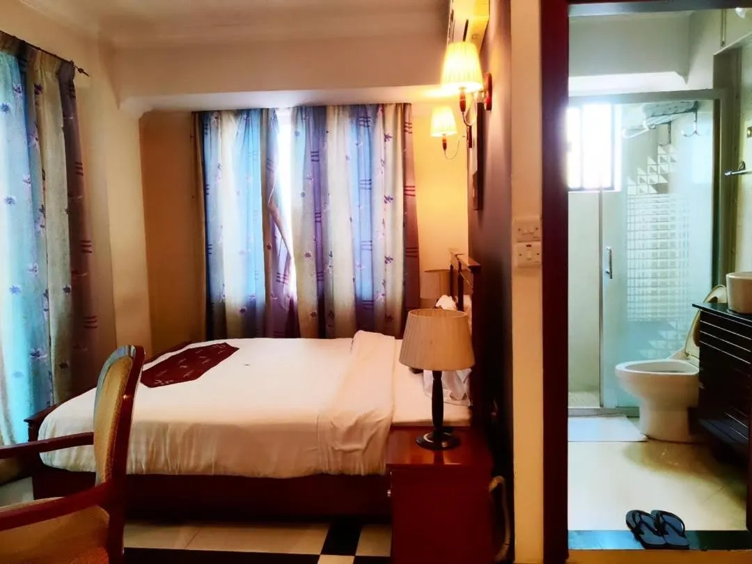 Toilet, Bed in Hotel Nikko Towers