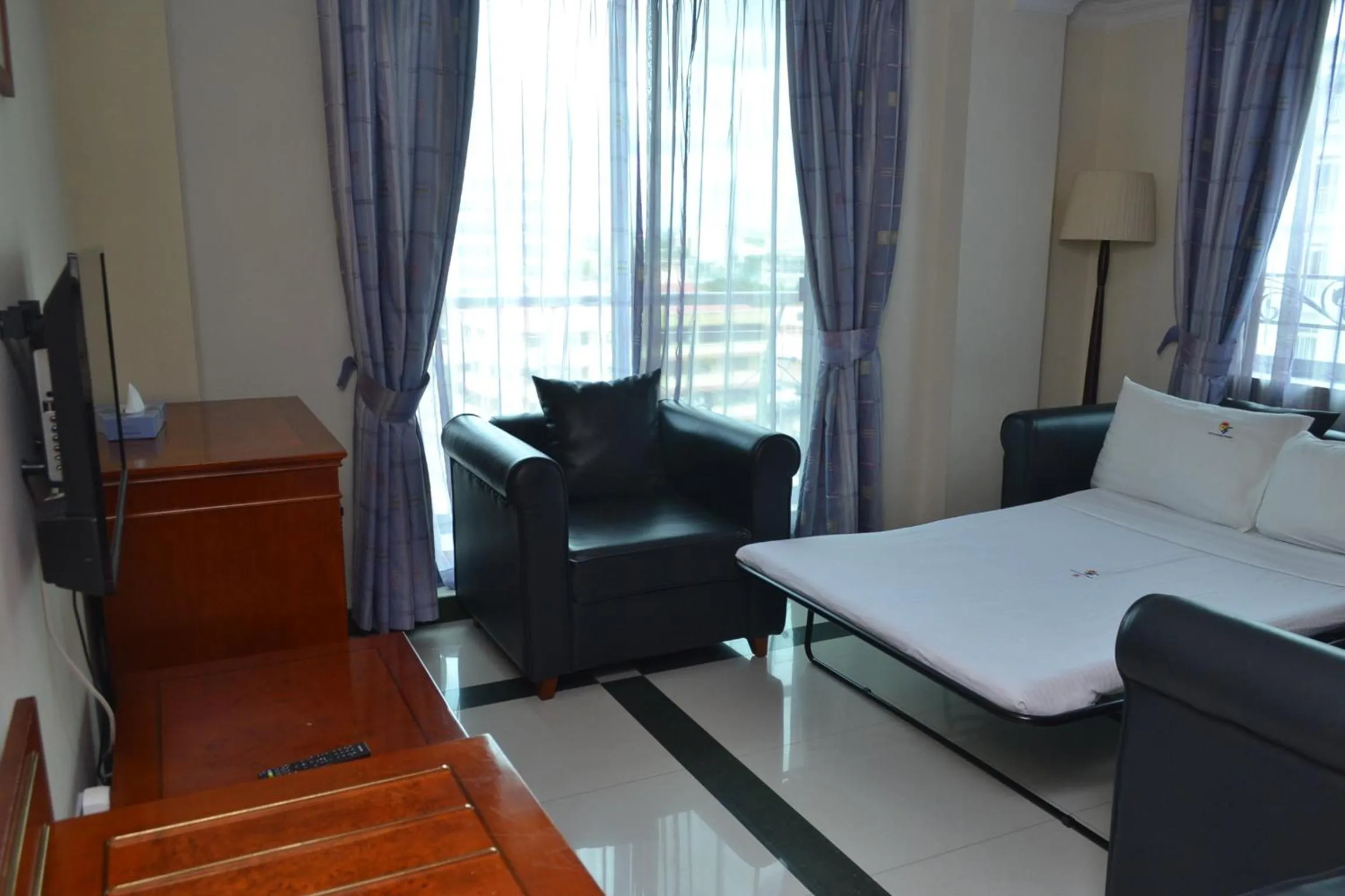 Bed in Hotel Nikko Towers