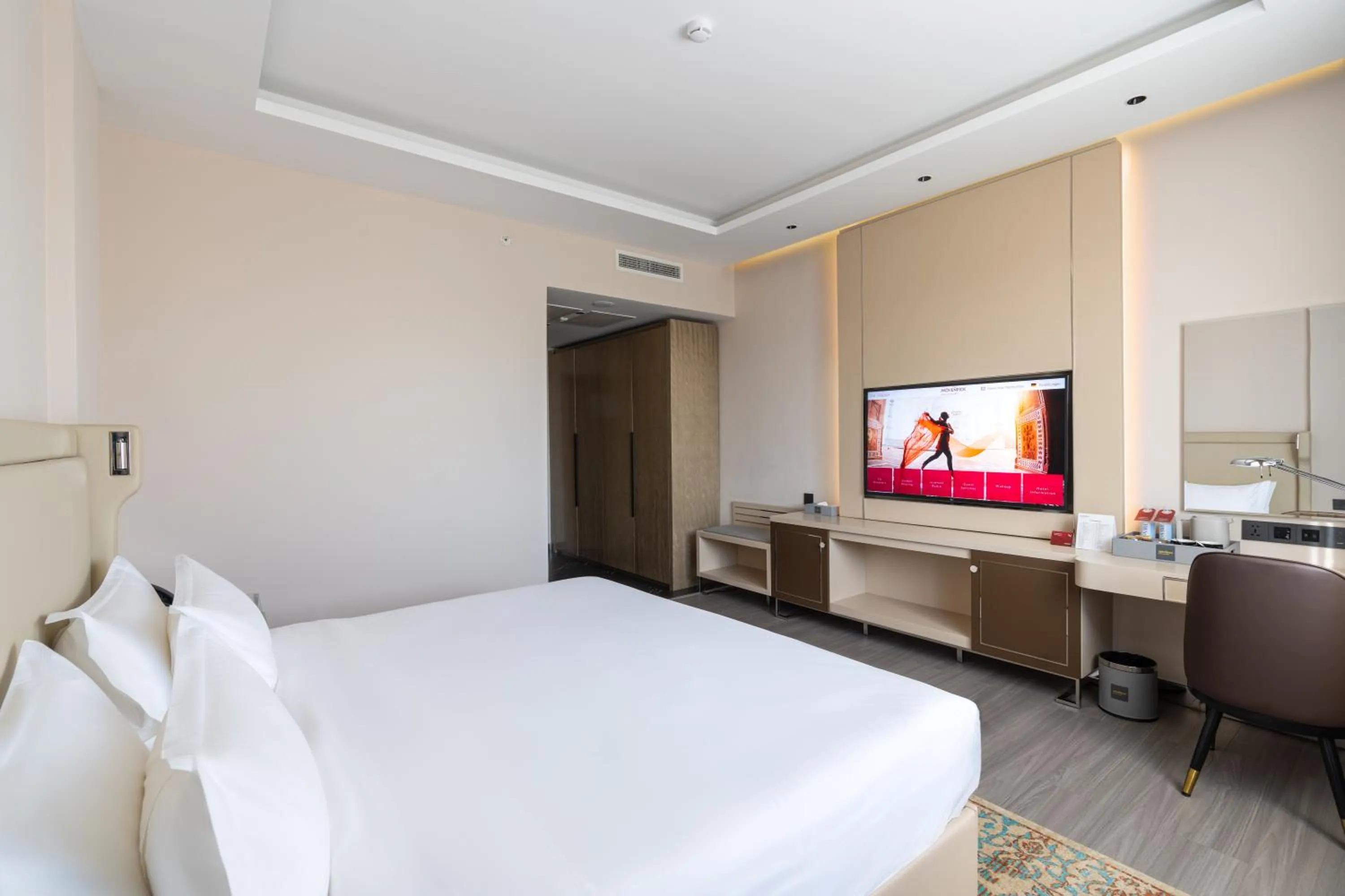 Photo of the whole room, Bed in Mövenpick Samarkand