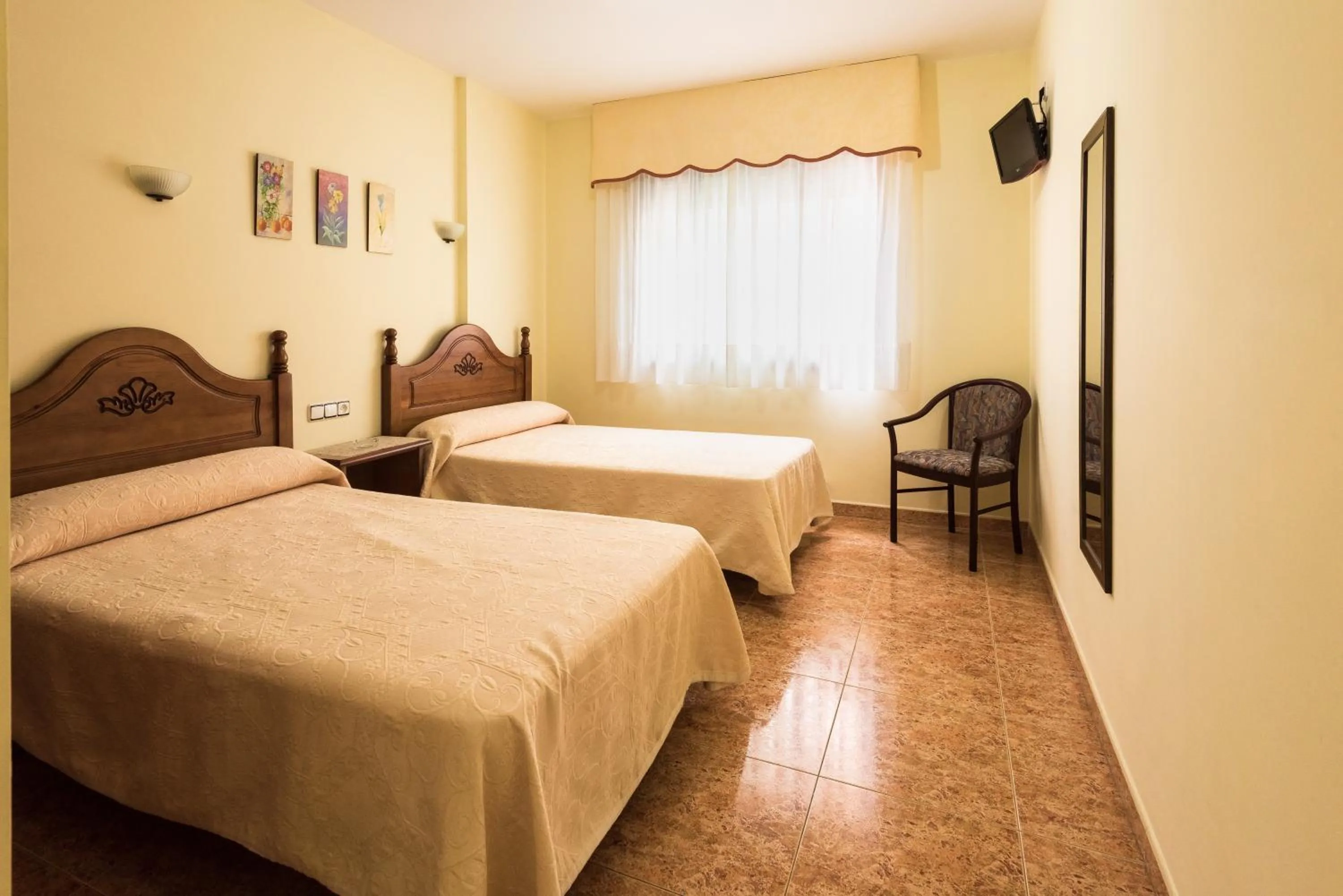 Bed in Hostal O Camouco