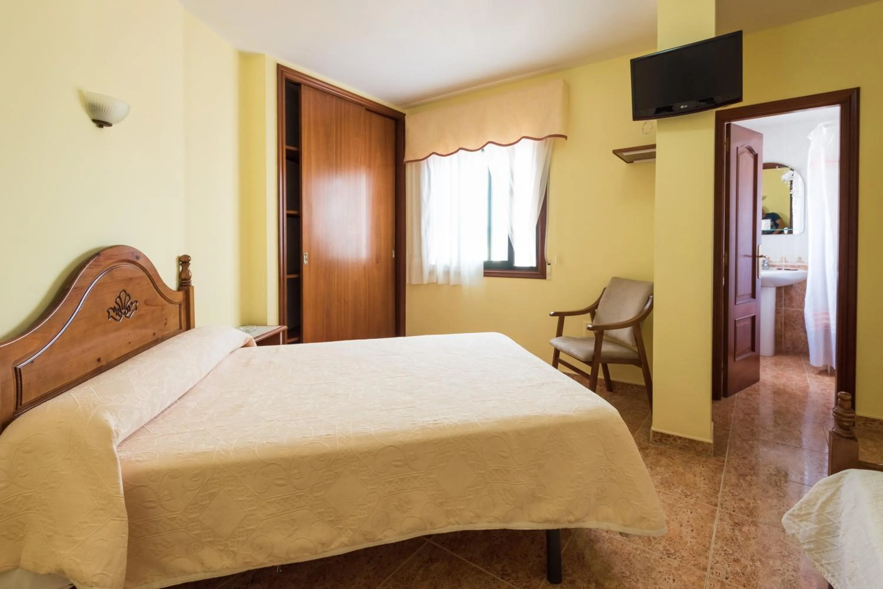 Bed in Hostal O Camouco