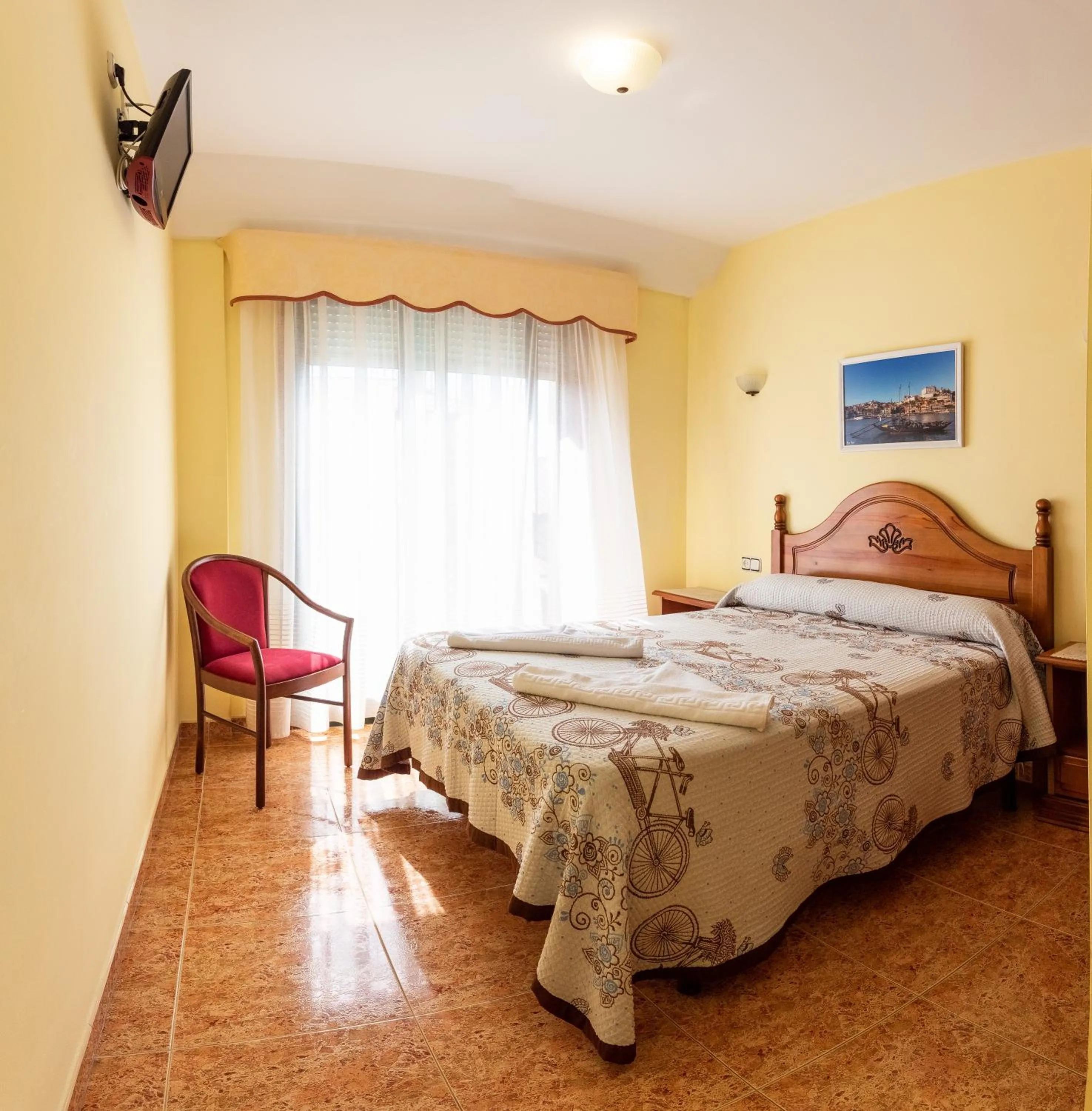 Bed in Hostal O Camouco