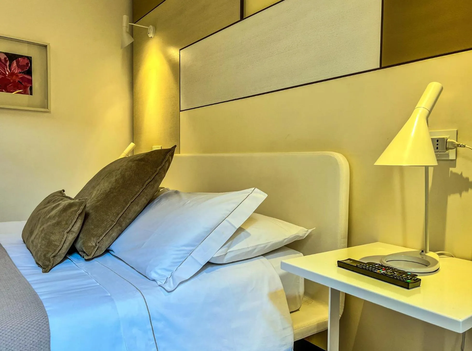 Bed in Santacroce Luxury Rooms