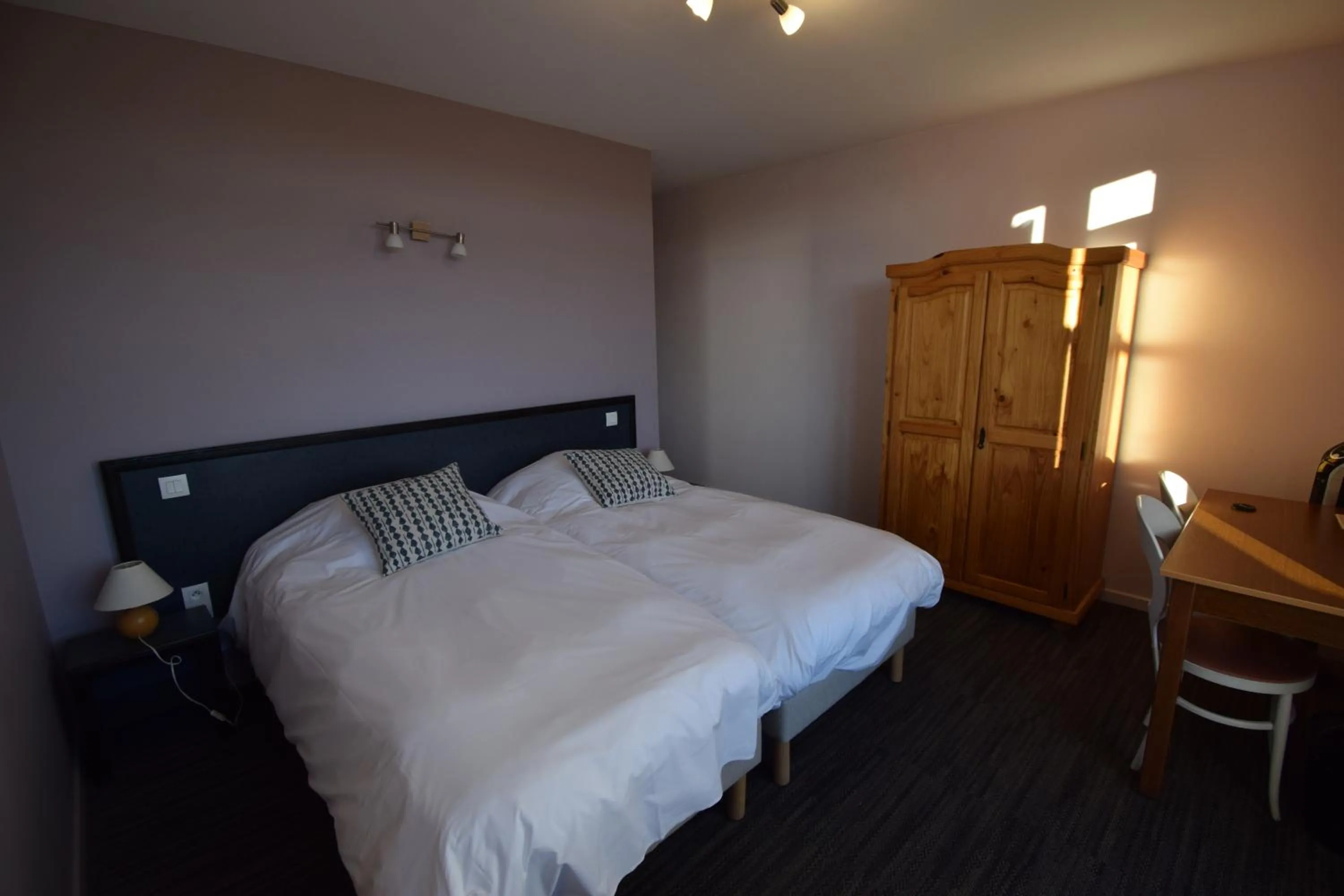 Bed in Hotel Les Chenets