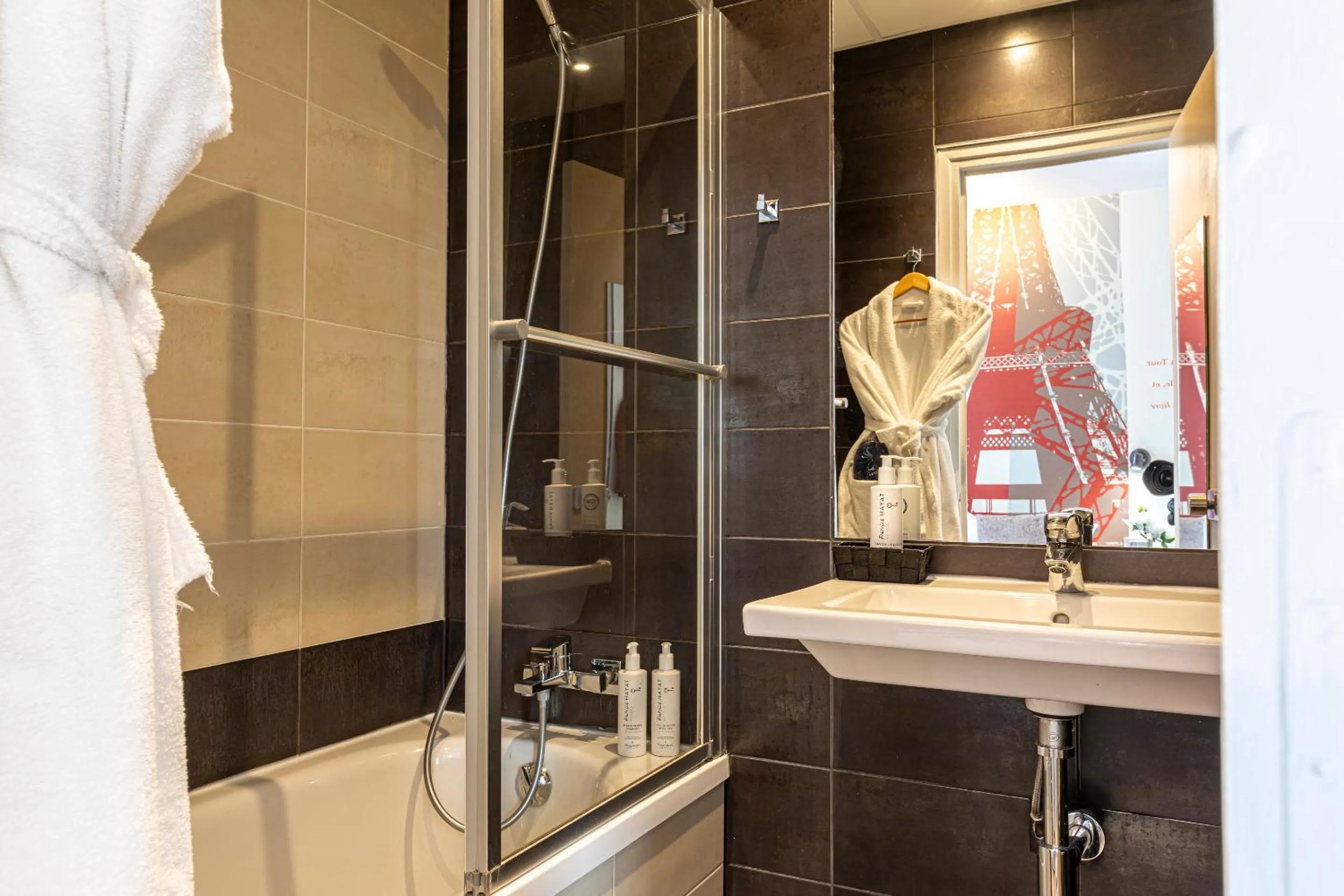 Bathroom in Hotel Alpha Paris Eiffel by Patrick Hayat