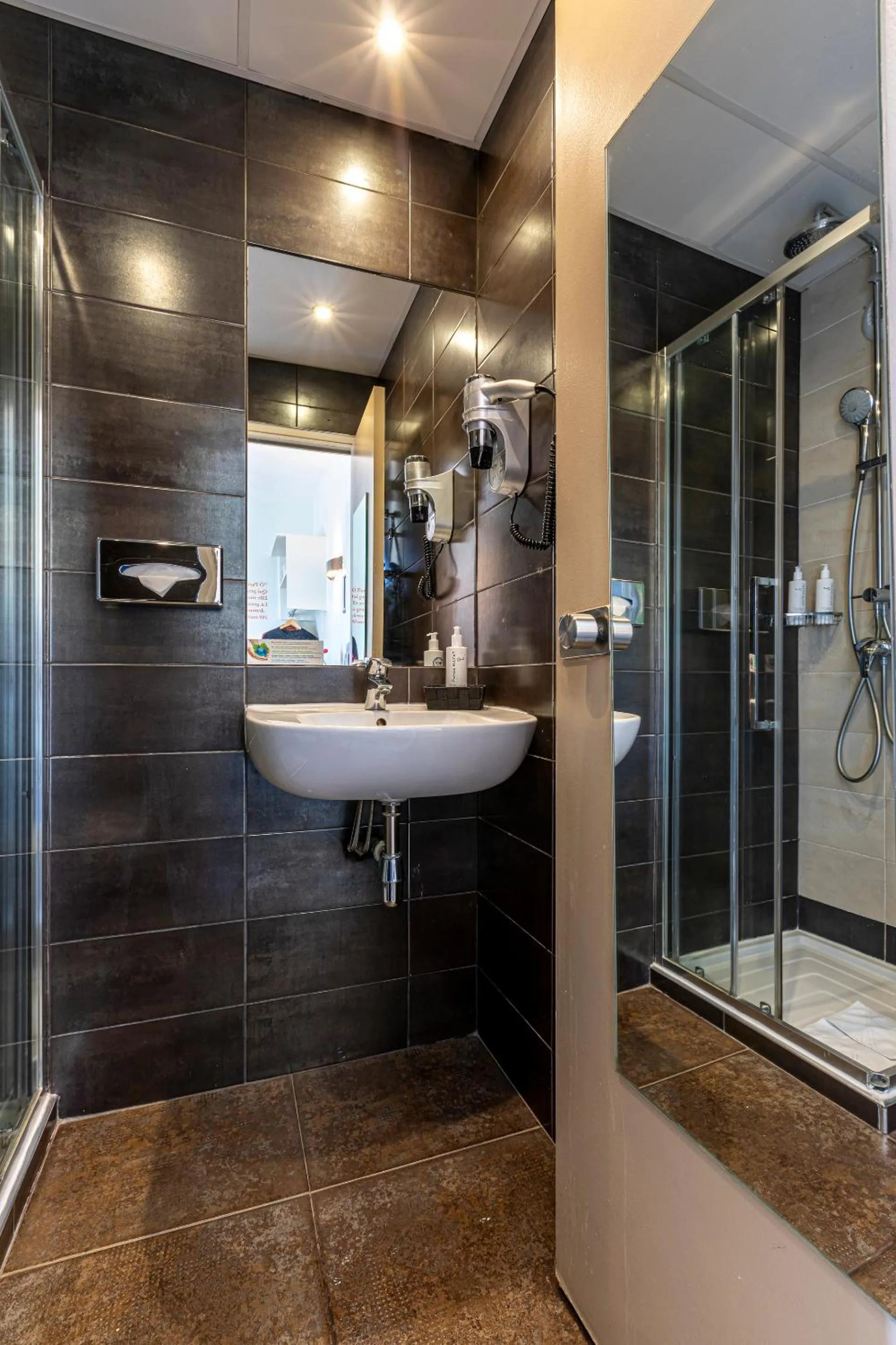 Shower in Hotel Alpha Paris Eiffel by Patrick Hayat