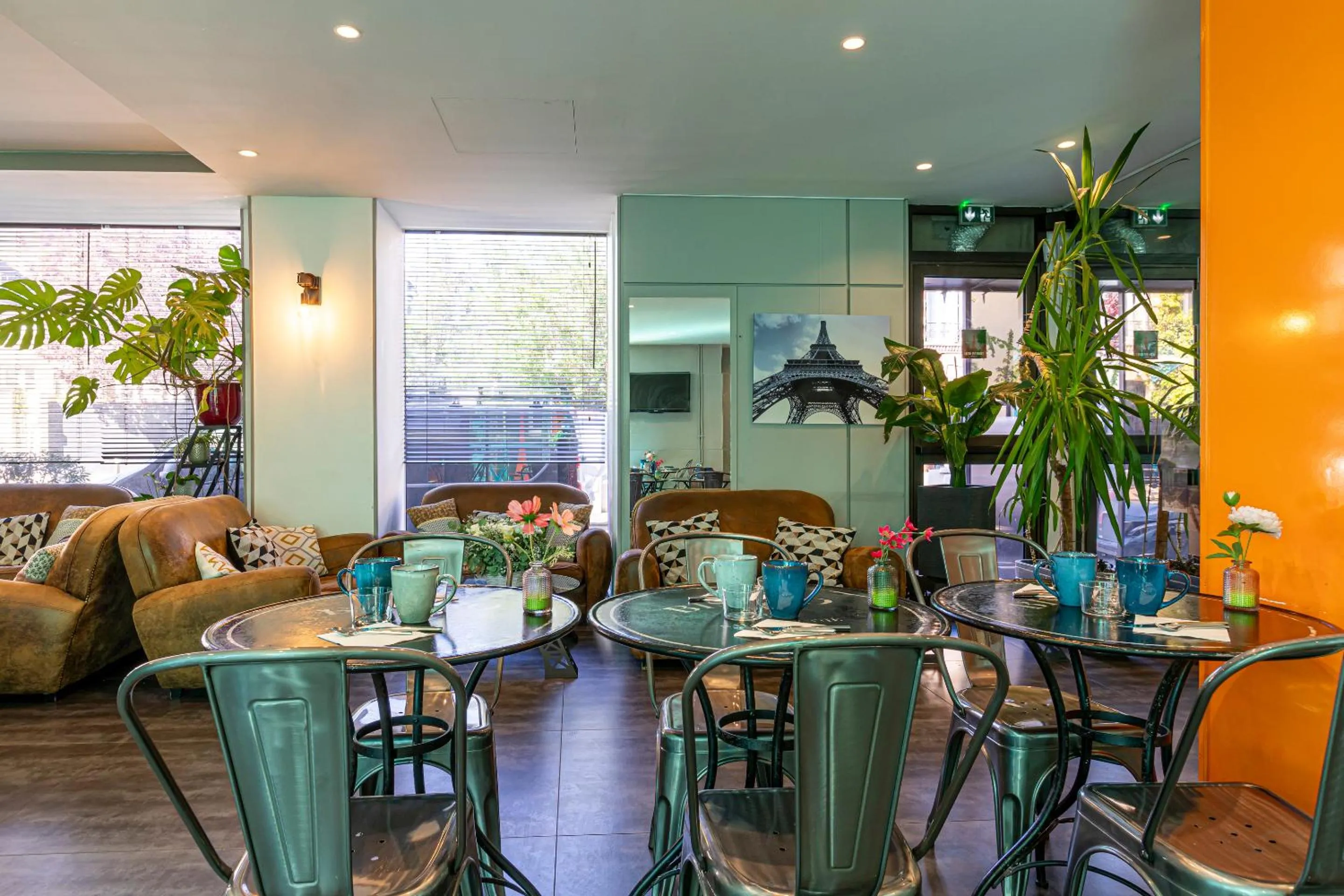 Communal lounge/ TV room in Hotel Alpha Paris Eiffel by Patrick Hayat