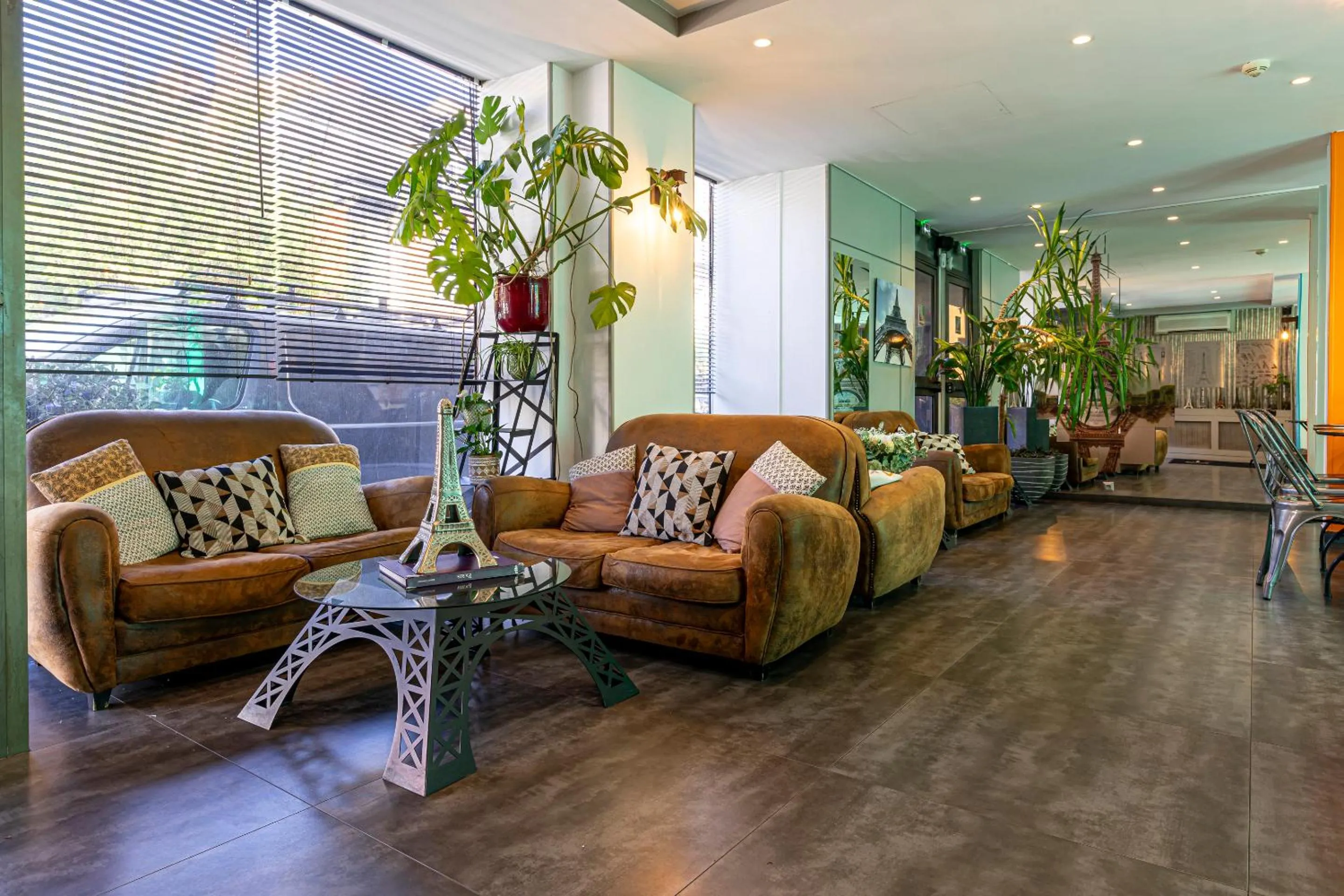 Living room in Hotel Alpha Paris Eiffel by Patrick Hayat