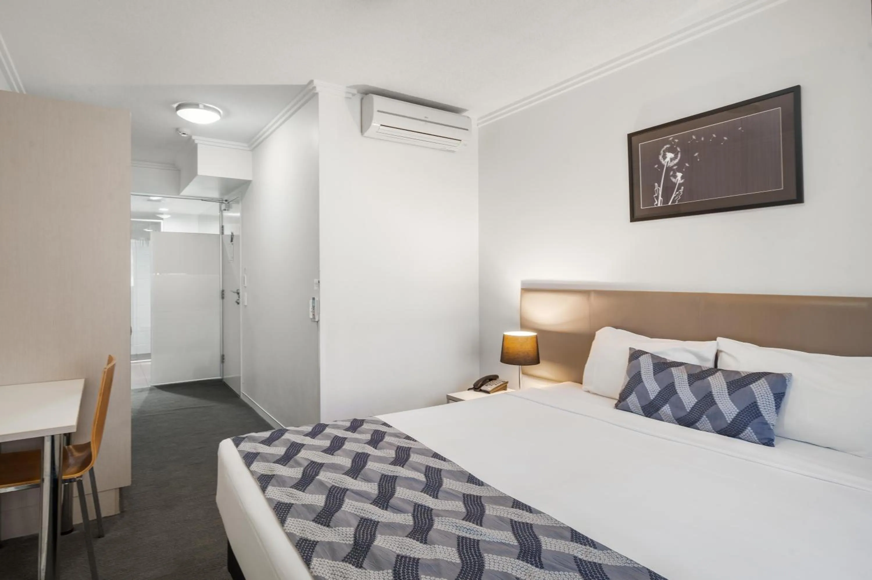 Bed in The Capitol Apartments