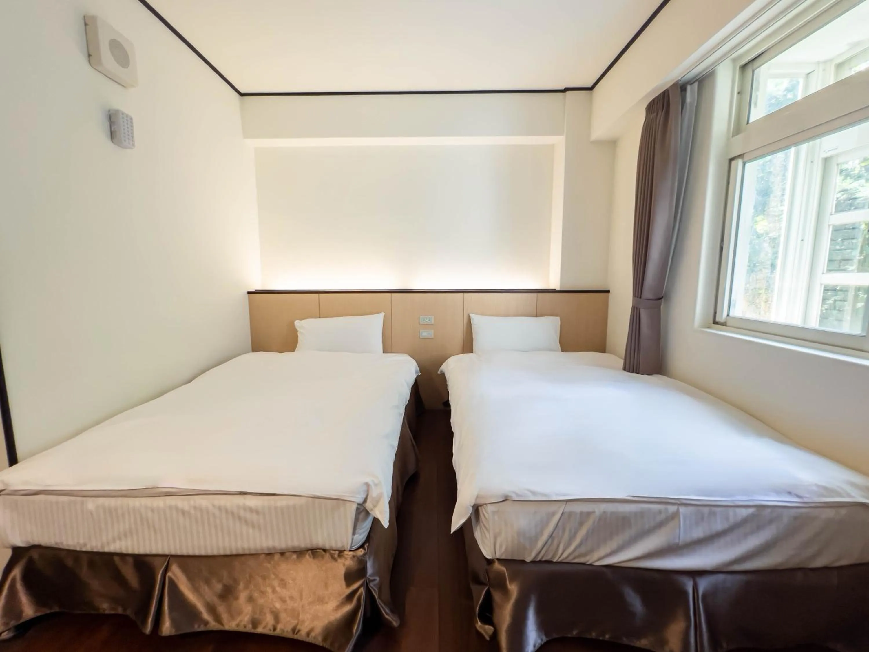 Bed in Tou-Cheng Leisure Farm Hotel