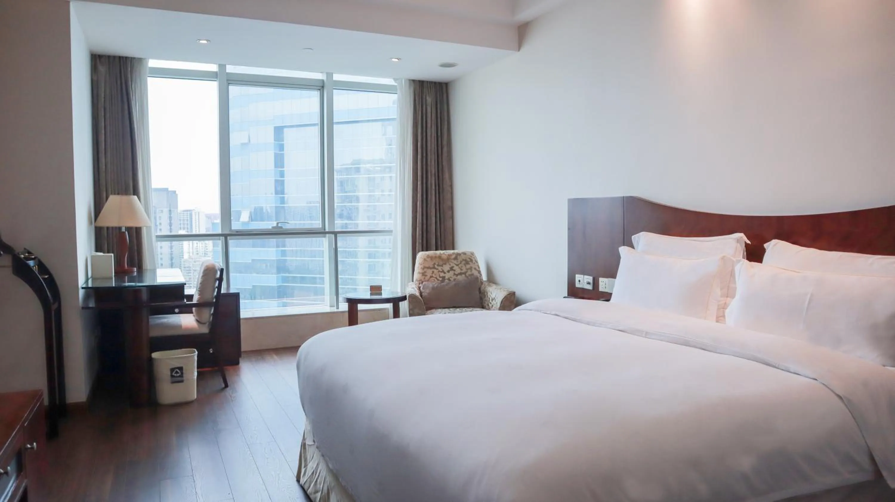 Bed in Shanghai Metropark Jichen Hotel