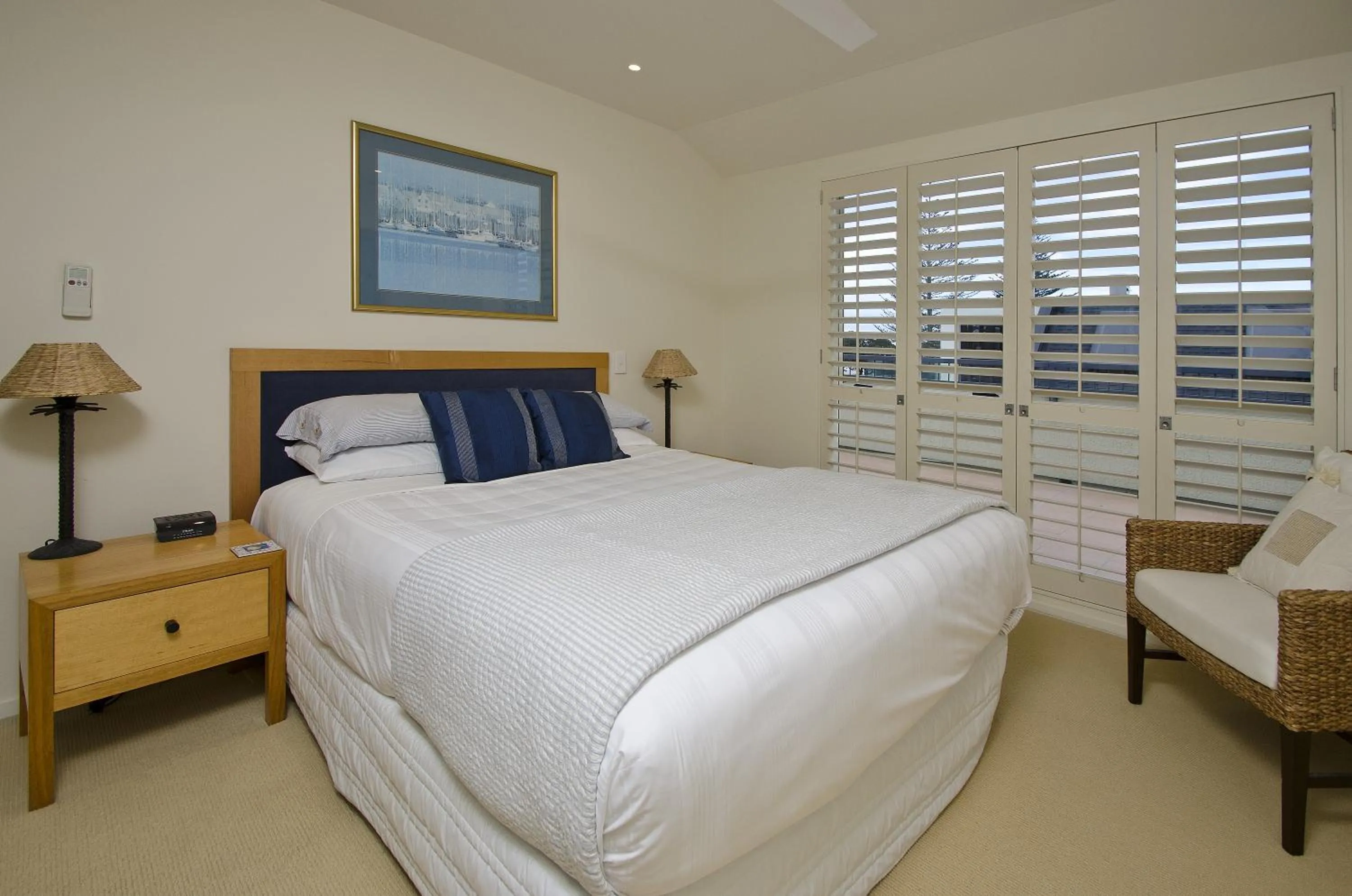 Bed in Pavilion Beachfront Apartments