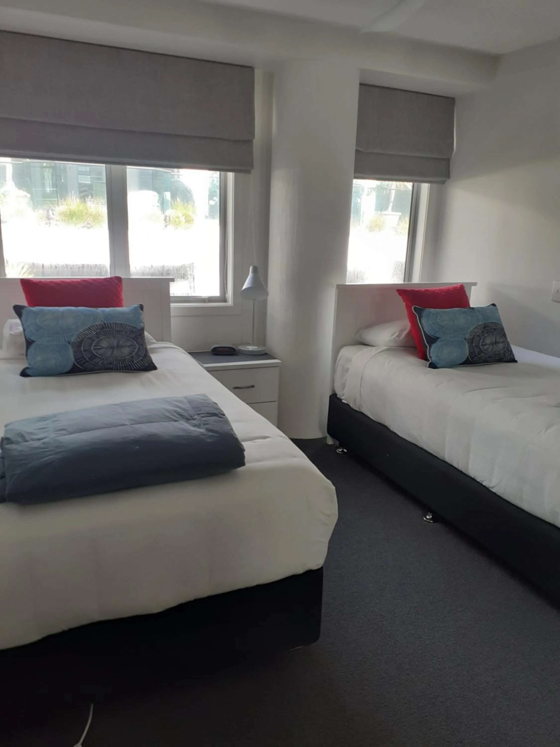 Bed in Pavilion Beachfront Apartments