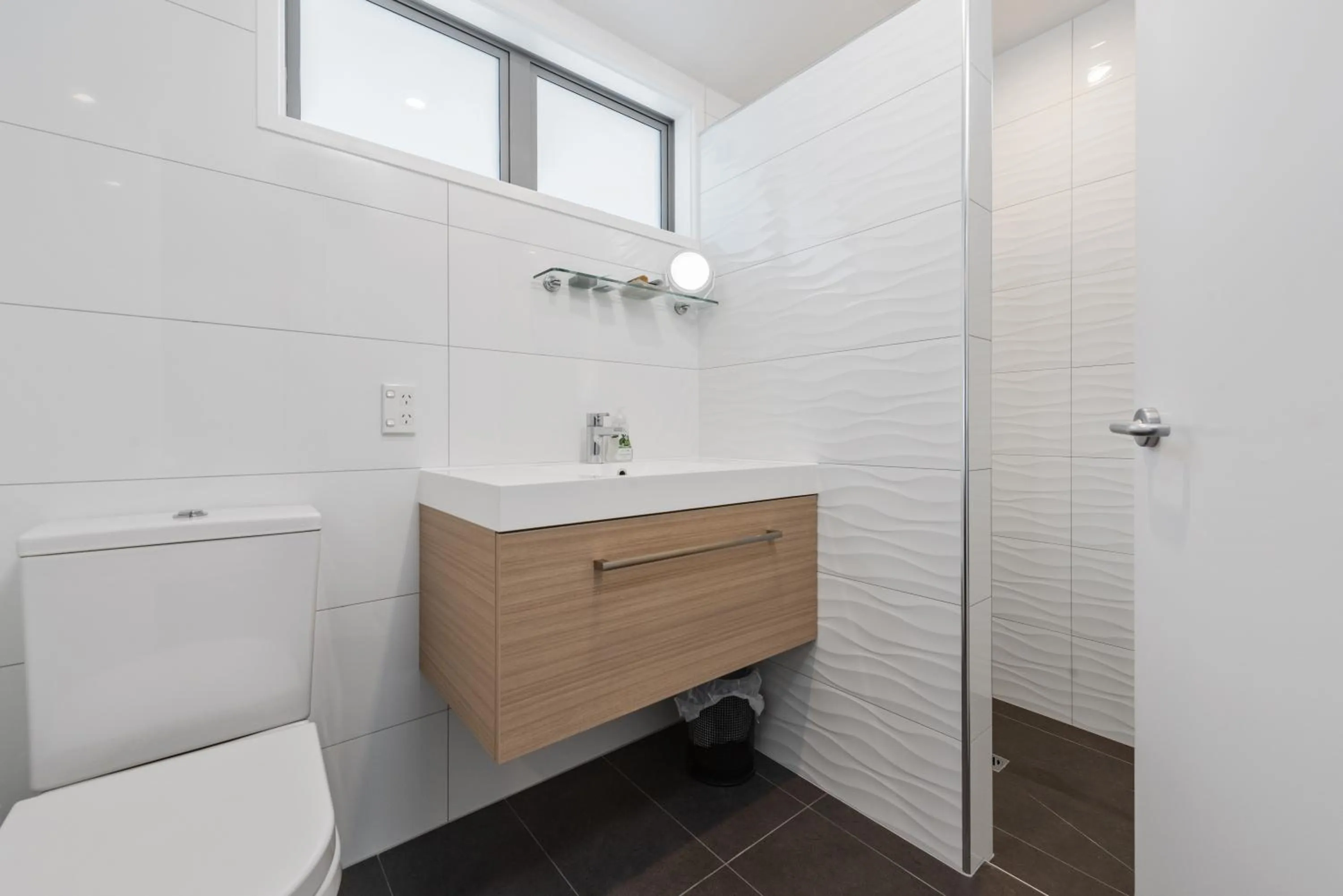 Shower in Pavilion Beachfront Apartments