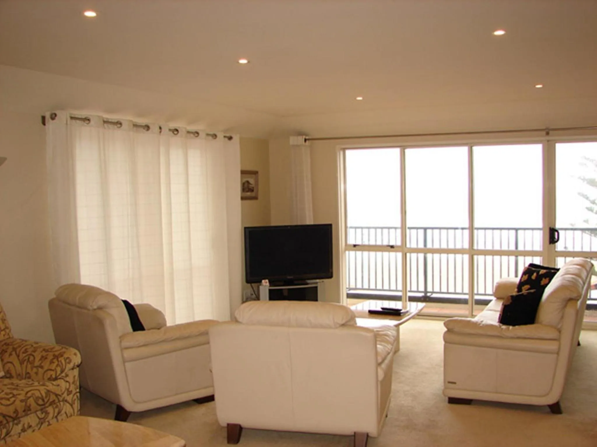 Living room in Pavilion Beachfront Apartments