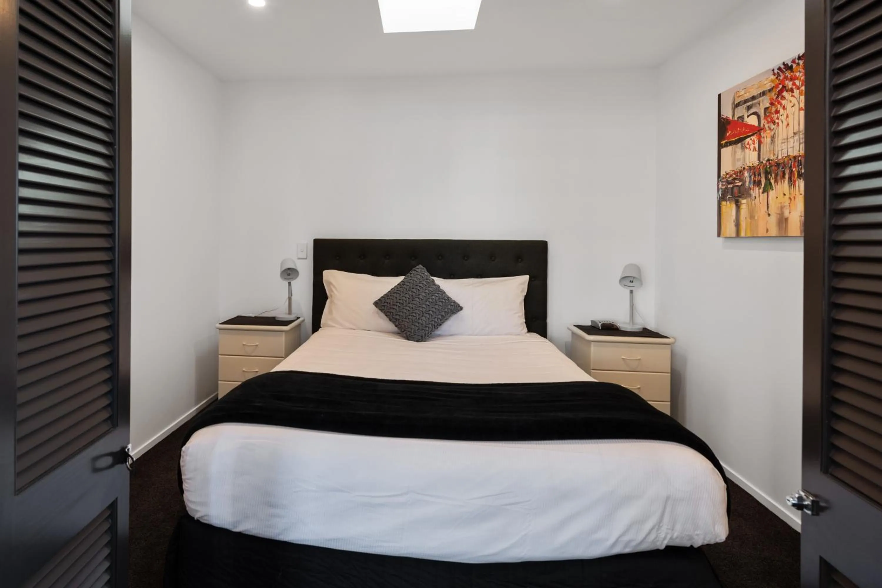 Bed in Pavilion Beachfront Apartments