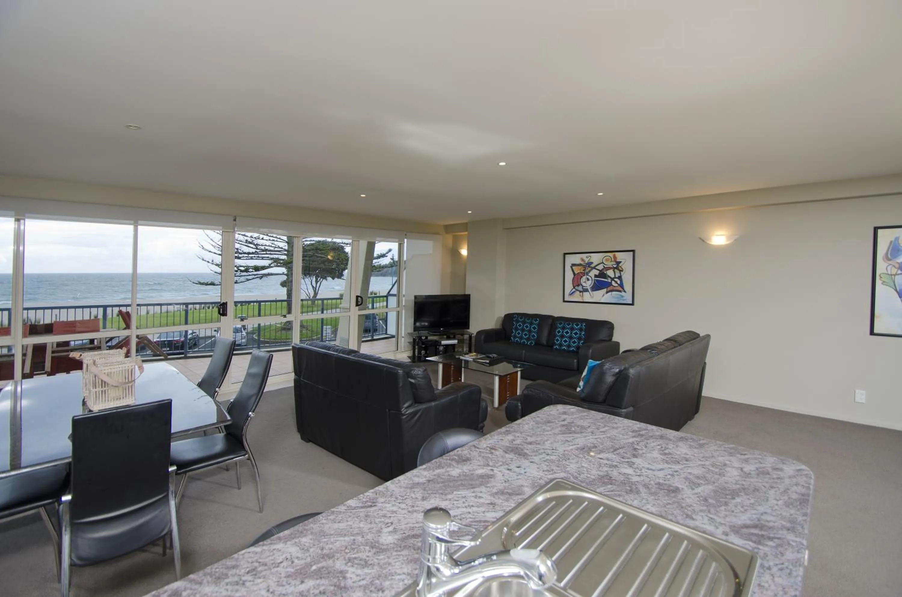 Living room in Pavilion Beachfront Apartments
