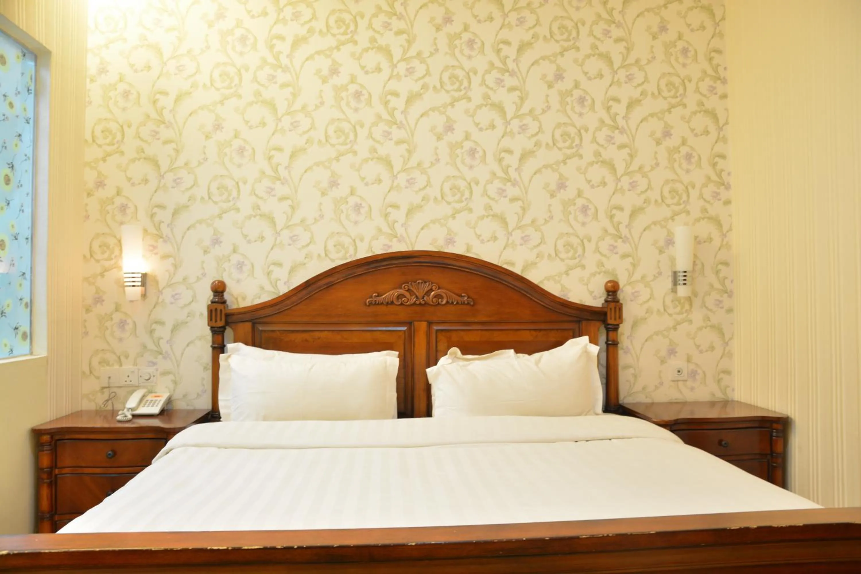 Bed in De Residence Hotel