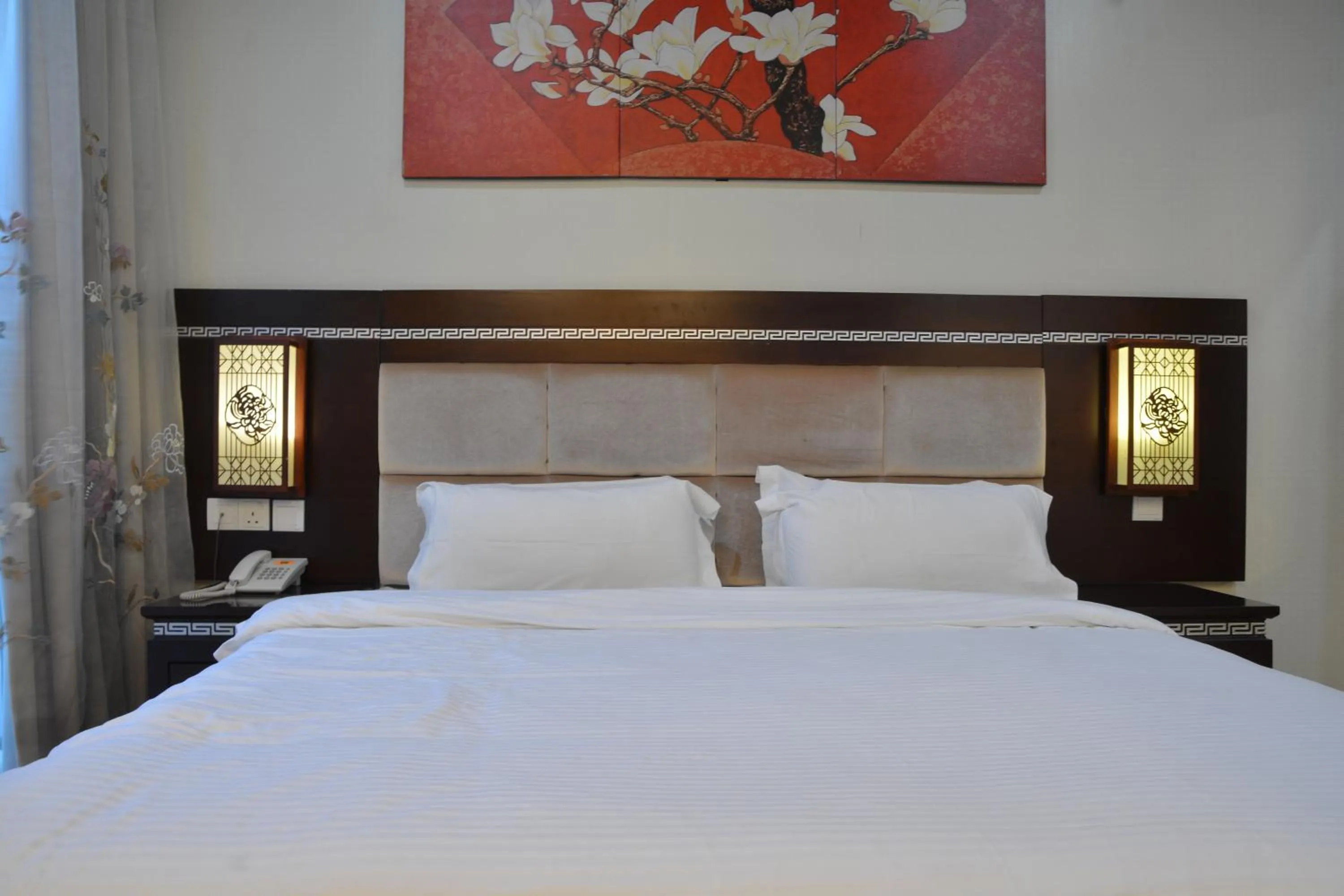 Bed in De Residence Hotel
