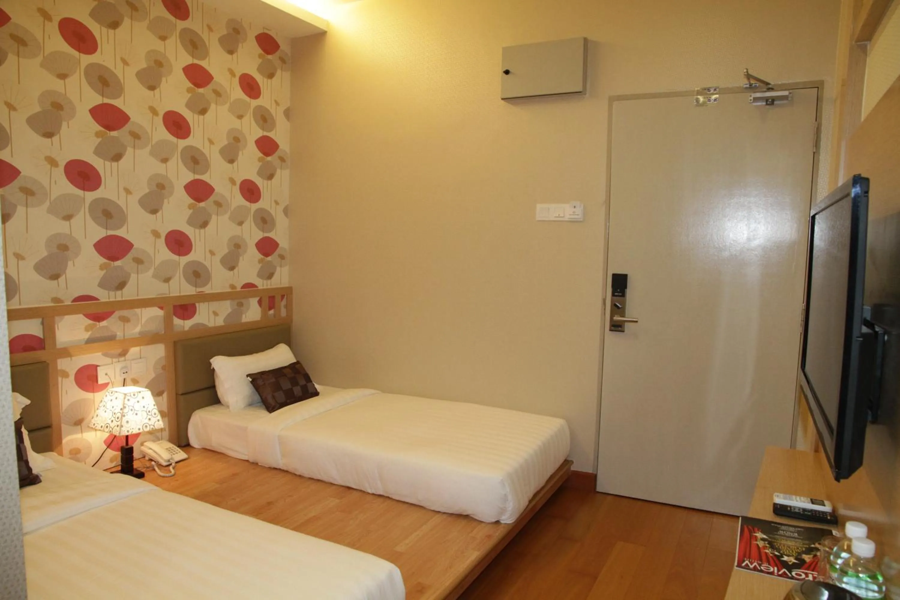 Bed in De Residence Hotel