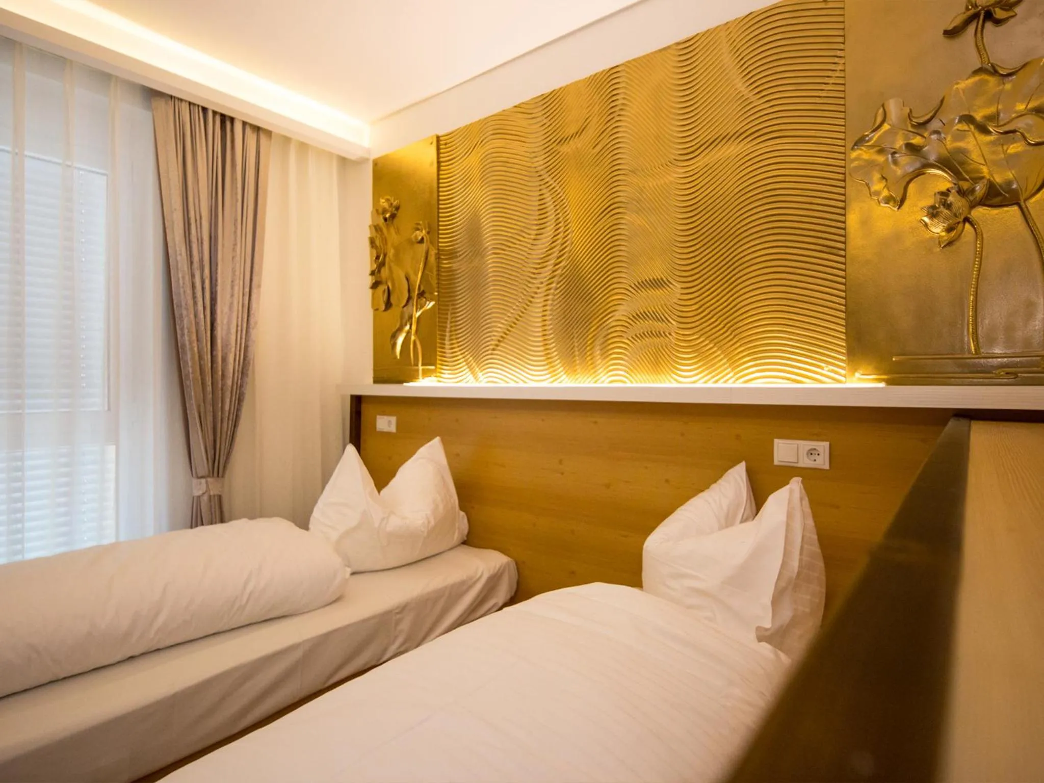 Bed in Hotel Kiwano Graz