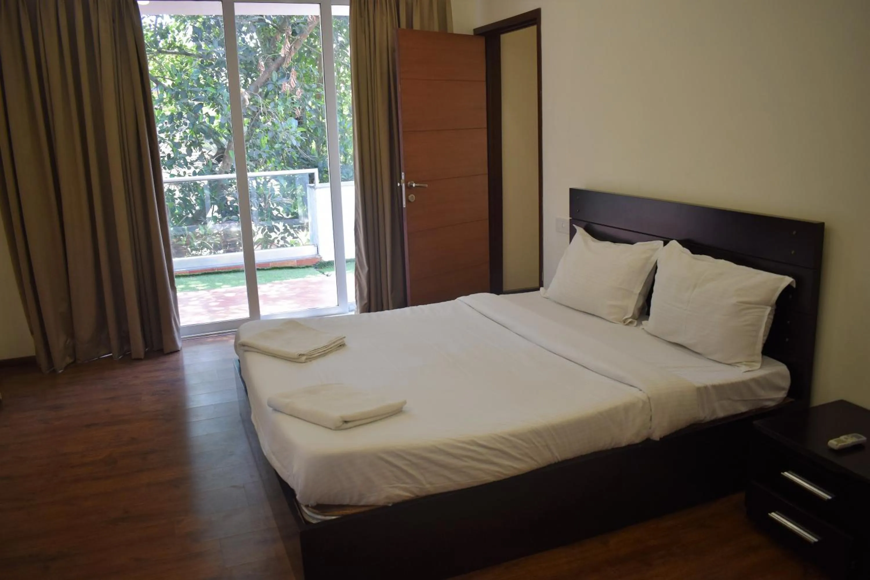 Bedroom, Bed in The Eternal Wave by Krish Retreat