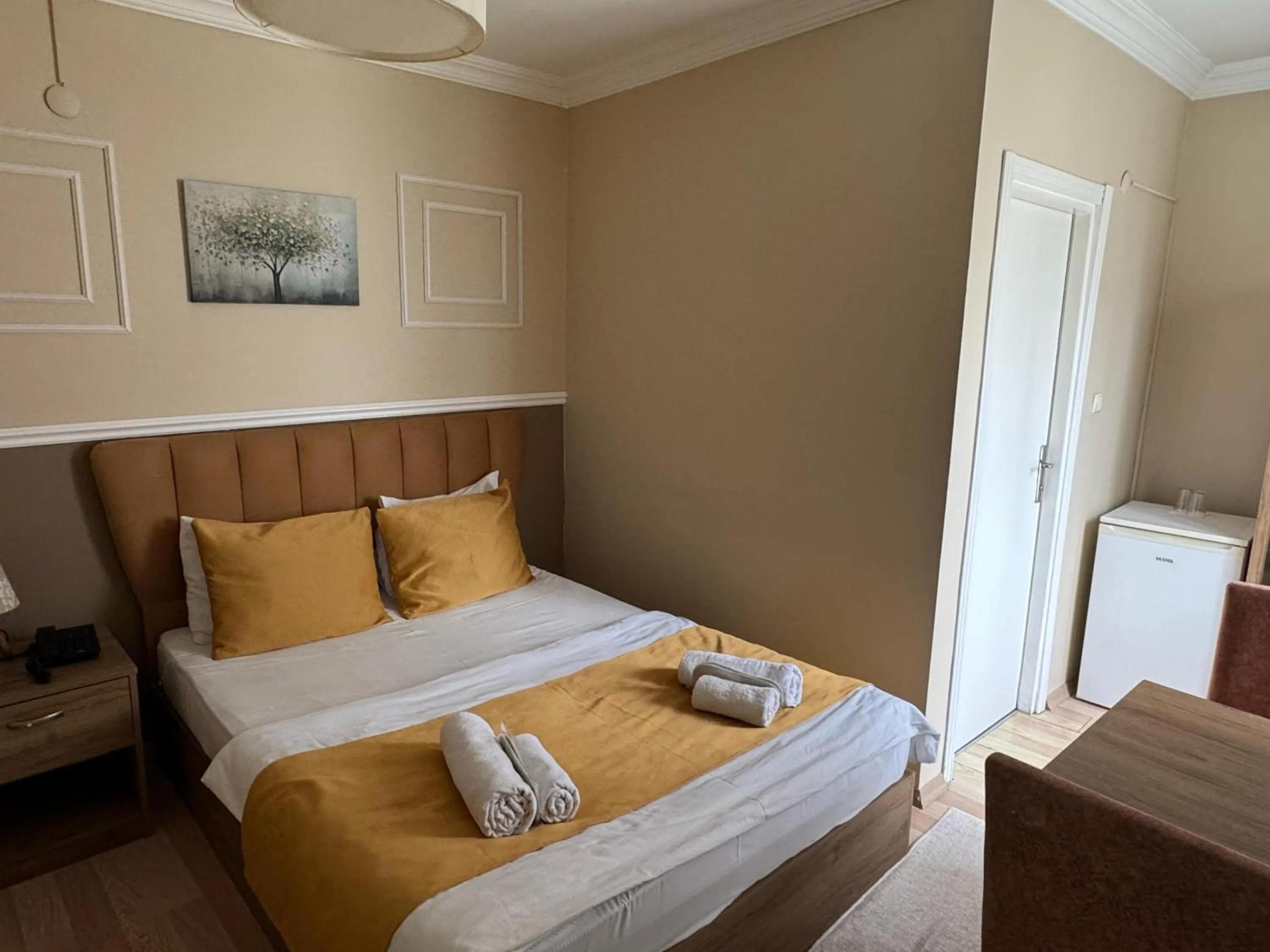 Bed in NEW BEYLERBEYİ HOTEL