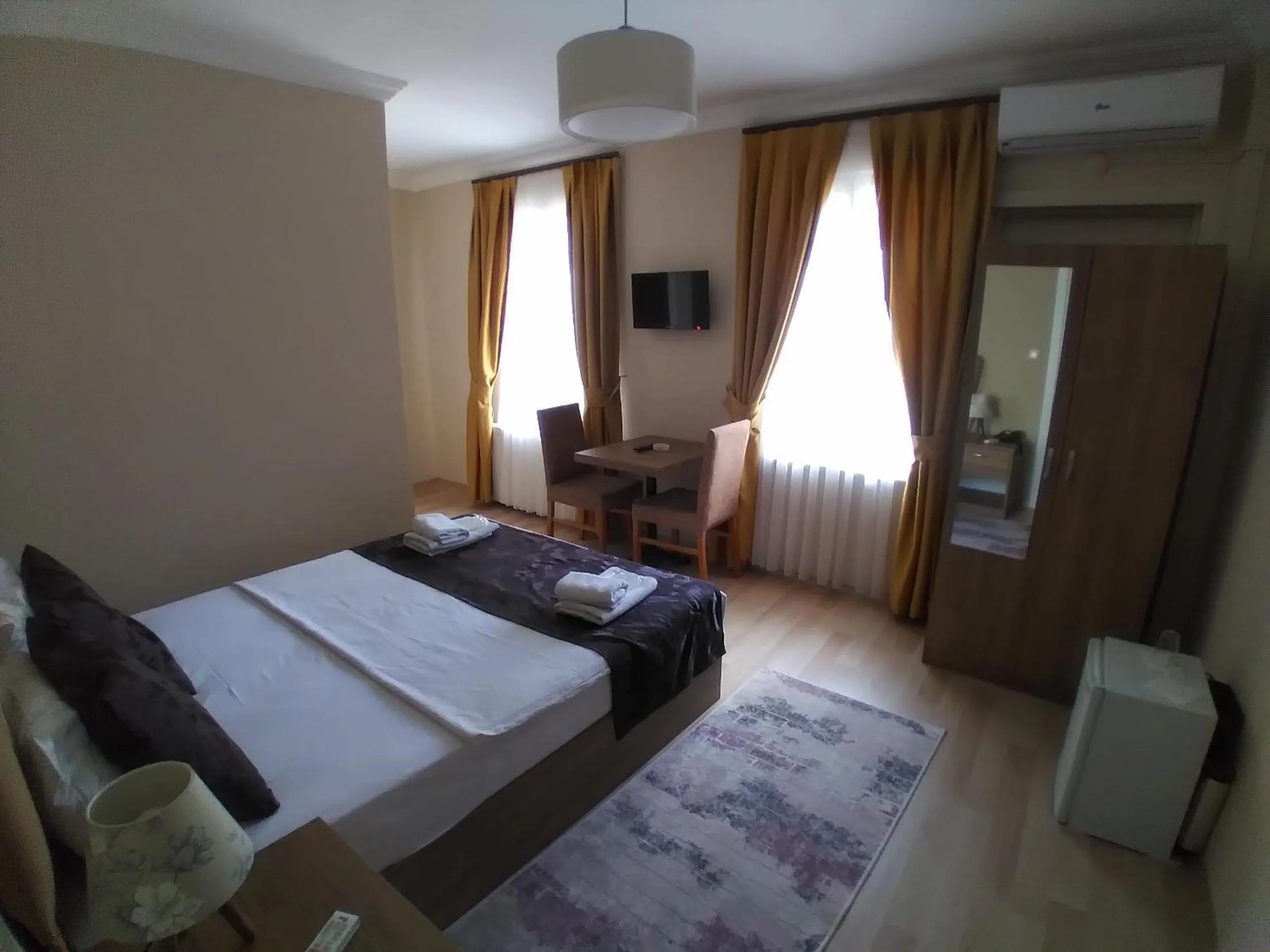 Photo of the whole room, Bed in NEW BEYLERBEYİ HOTEL