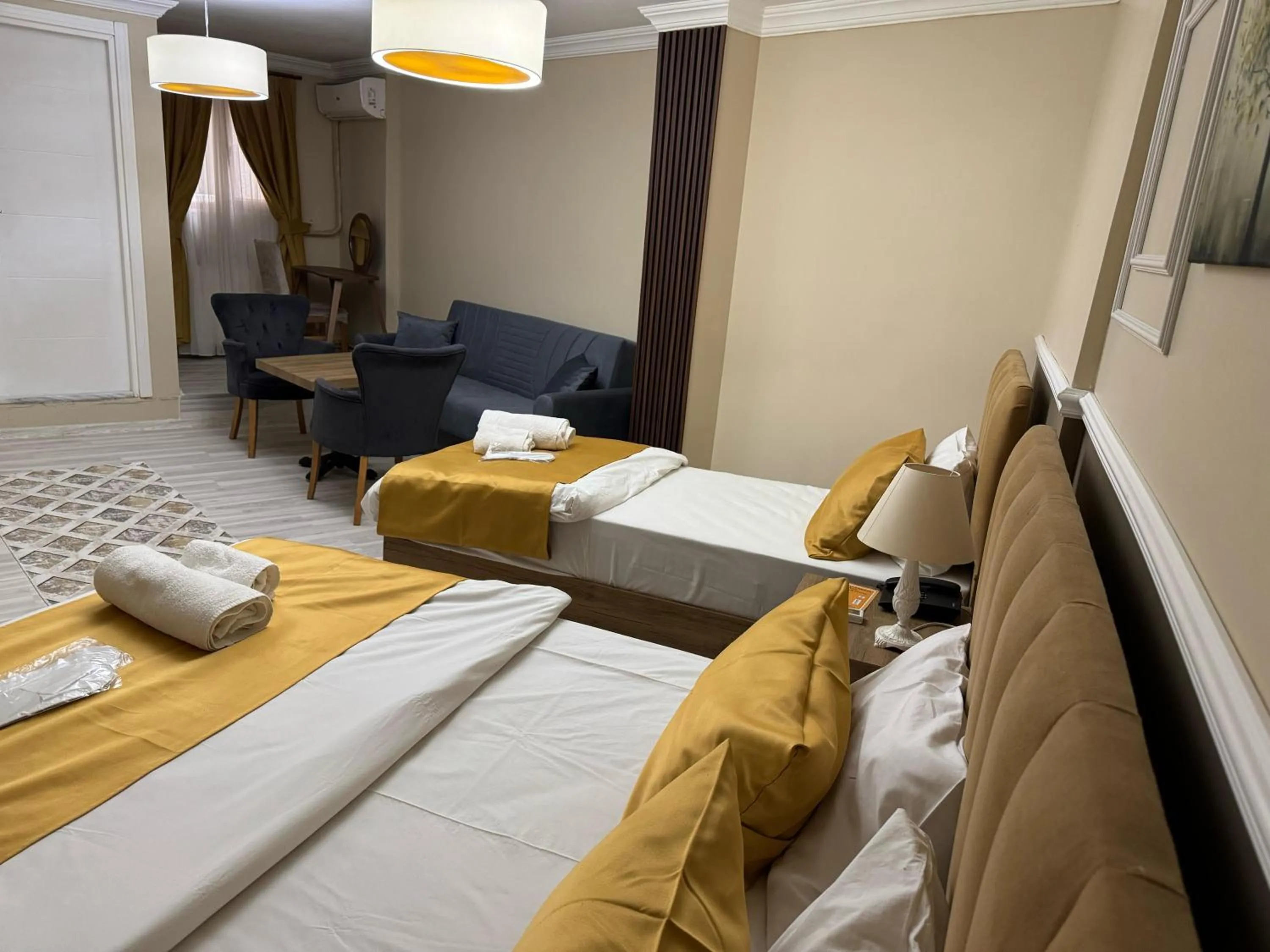 Bed in NEW BEYLERBEYİ HOTEL