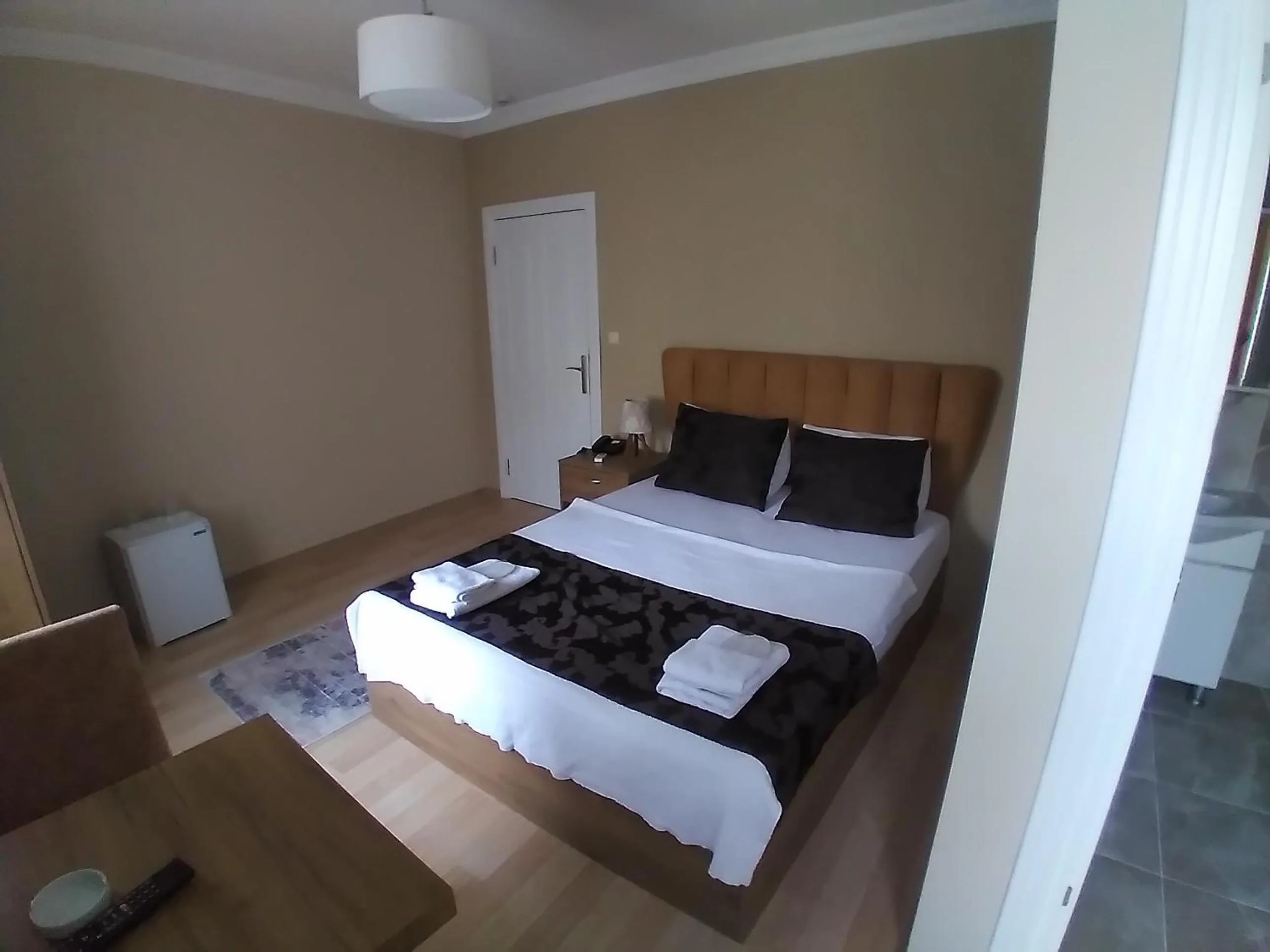 Photo of the whole room, Bed in NEW BEYLERBEYİ HOTEL