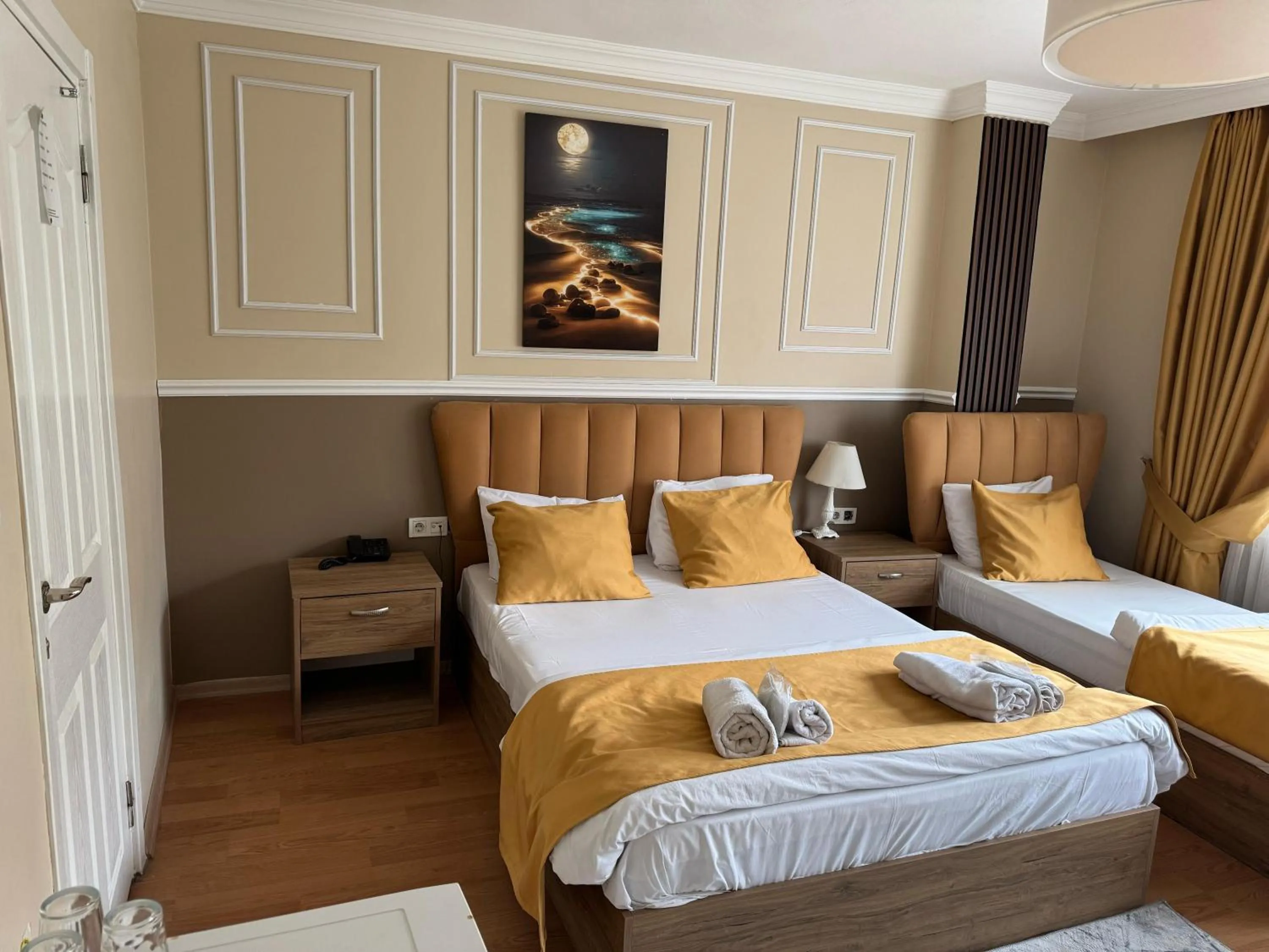 Bed in NEW BEYLERBEYİ HOTEL