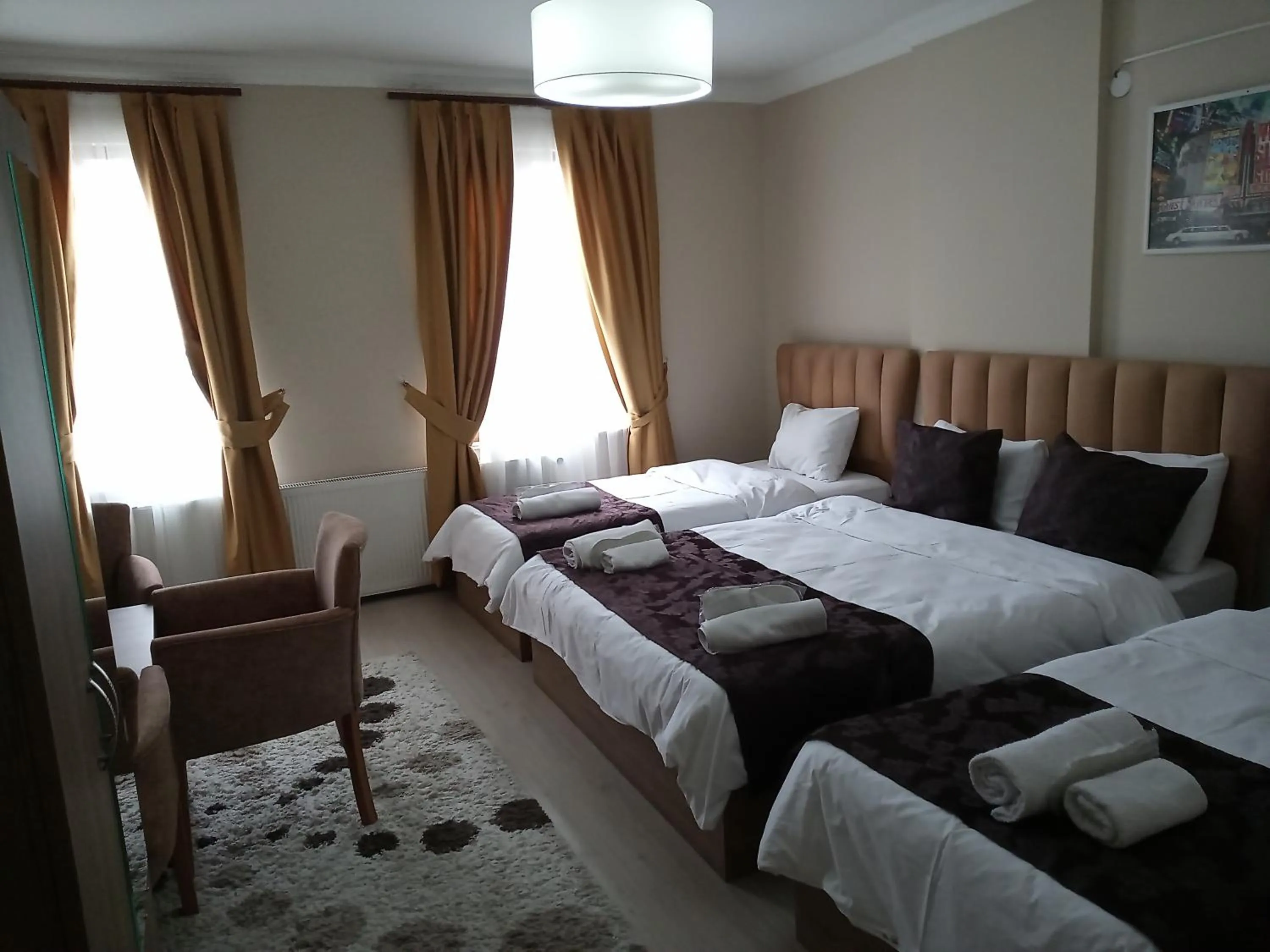 Photo of the whole room, Bed in NEW BEYLERBEYİ HOTEL