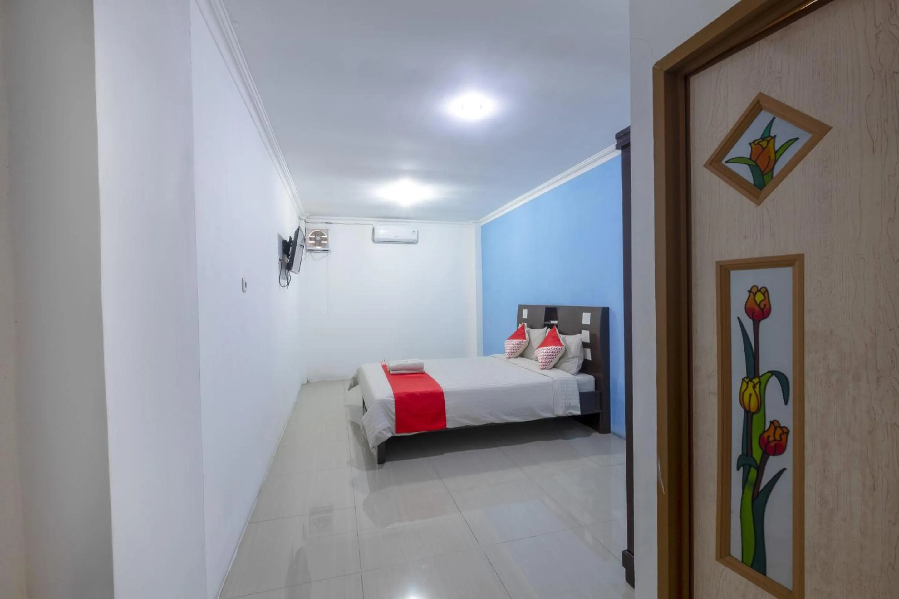 Photo of the whole room, Bed in Hotel O Cibubur Near Cibubur Junction Formerly Comfort Residence