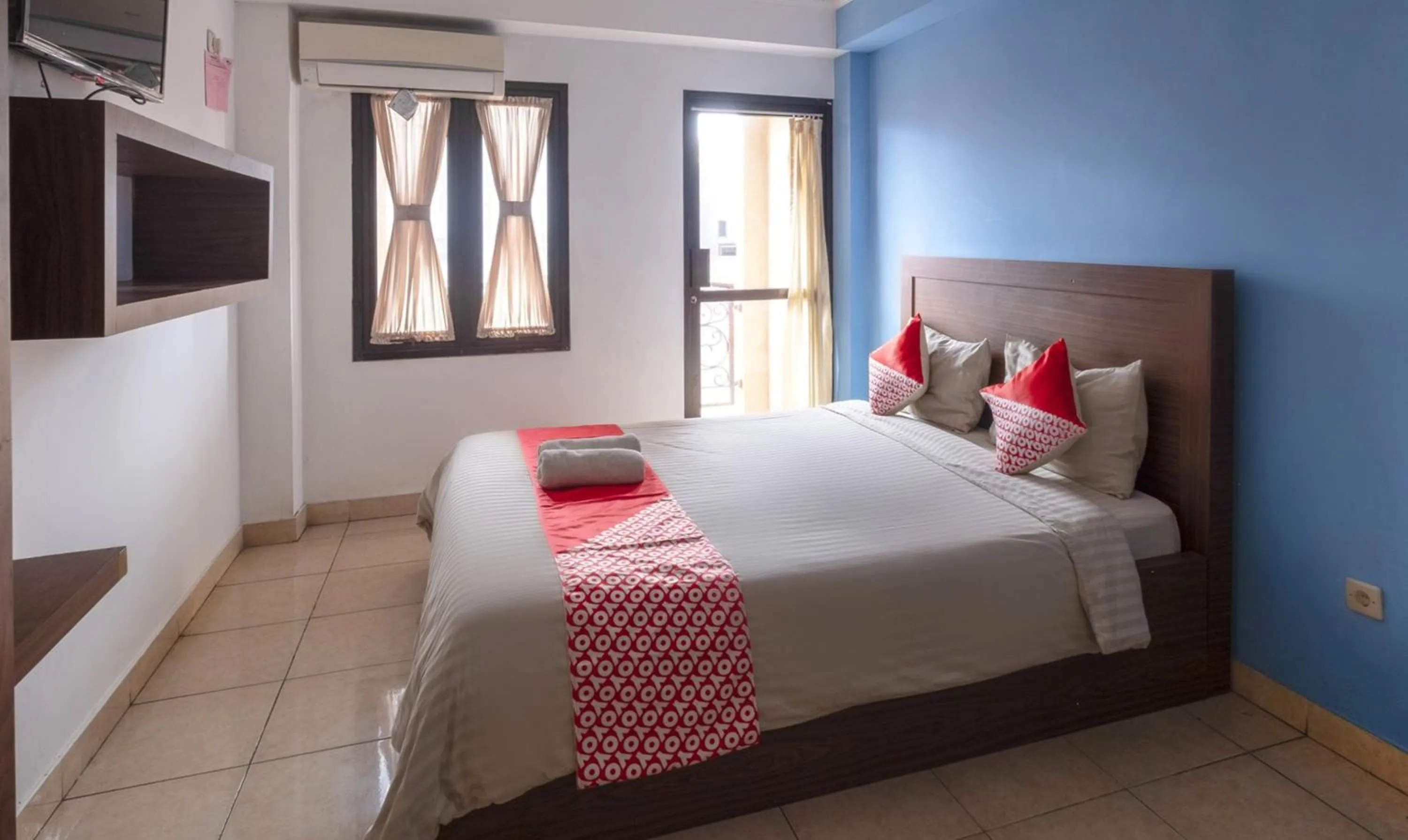 Photo of the whole room, Bed in Hotel O Cibubur Near Cibubur Junction Formerly Comfort Residence