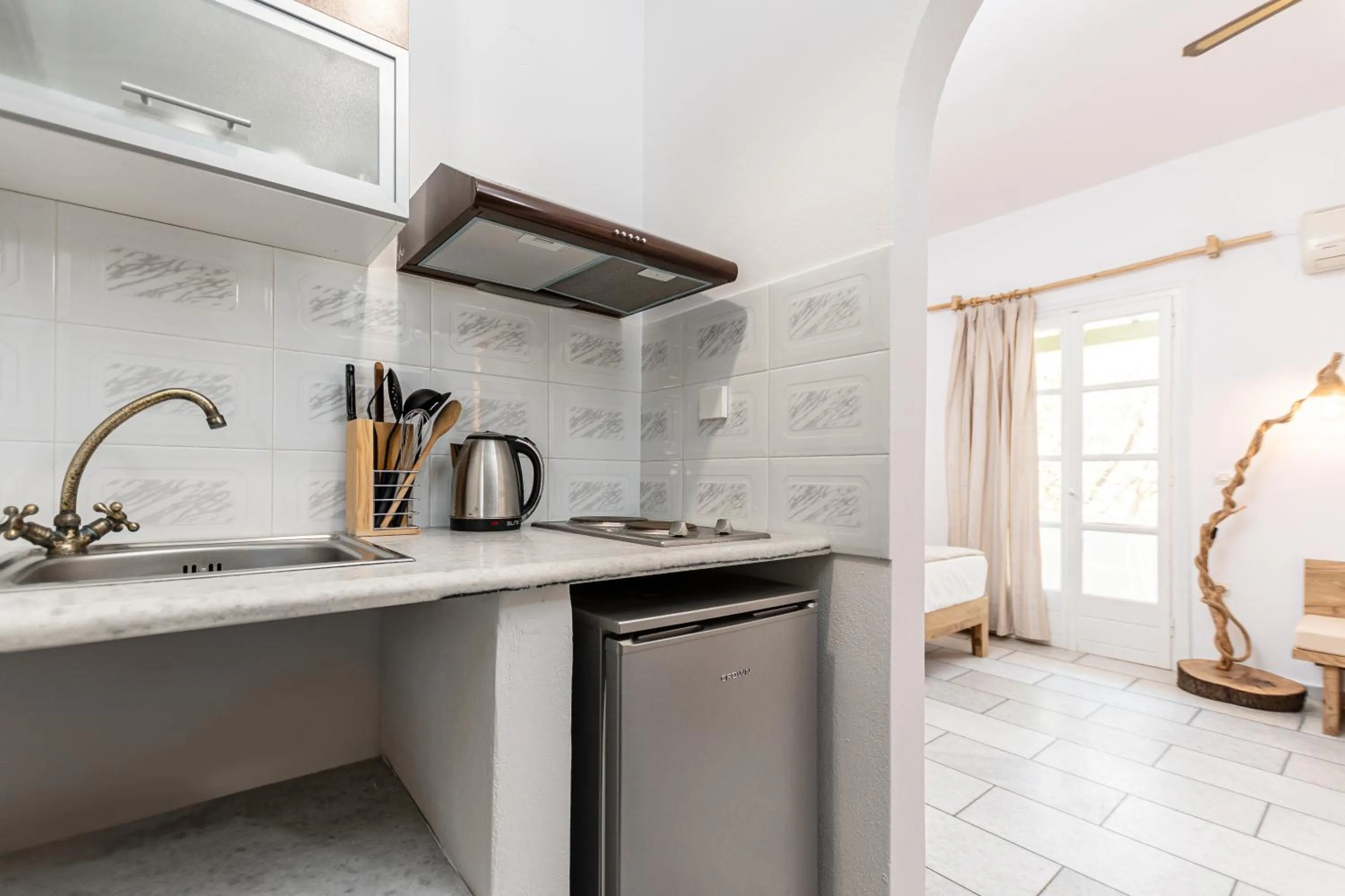 kitchen in Studios Vrettos Beachfront Hotel