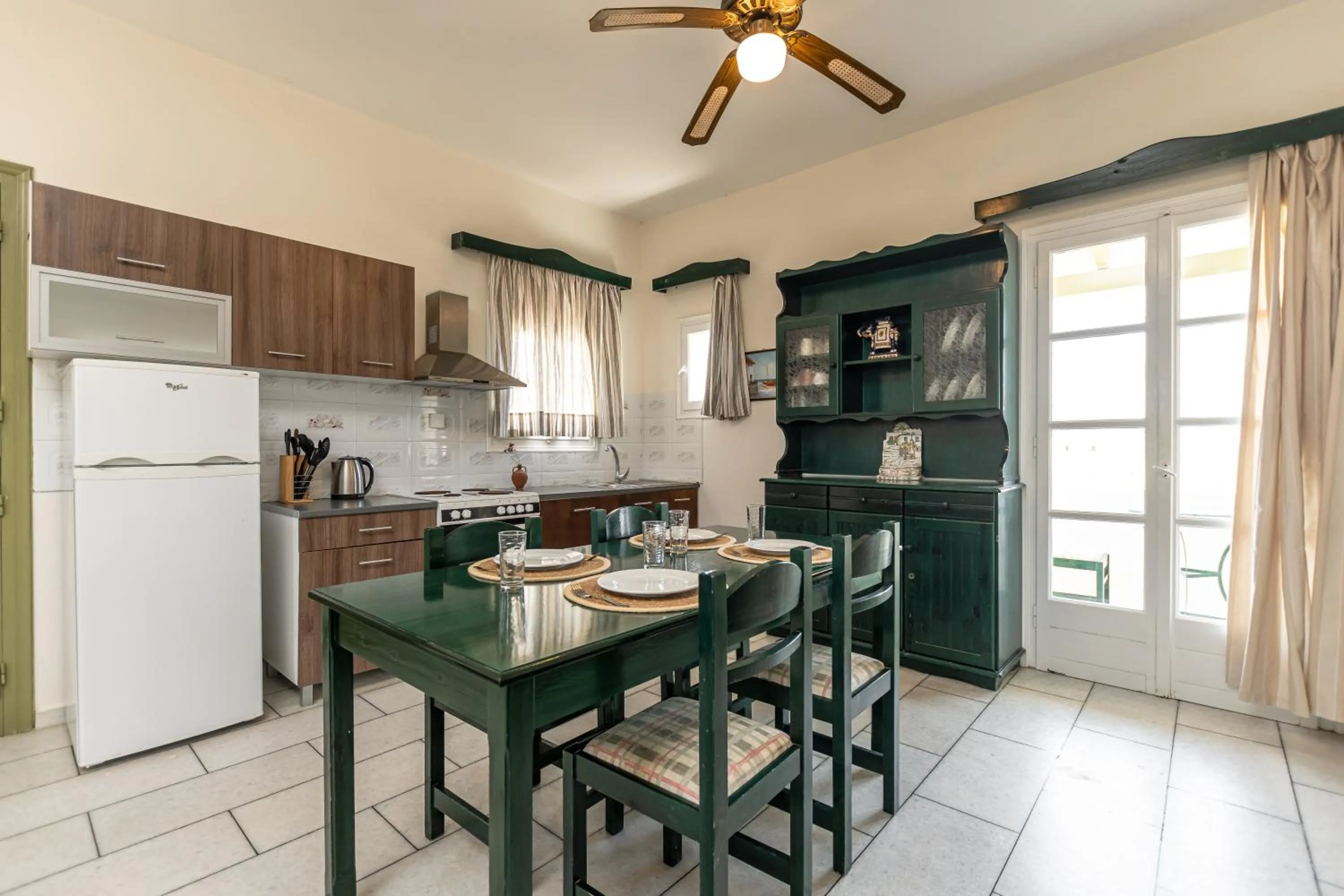 Kitchen or kitchenette in Studios Vrettos Beachfront Hotel