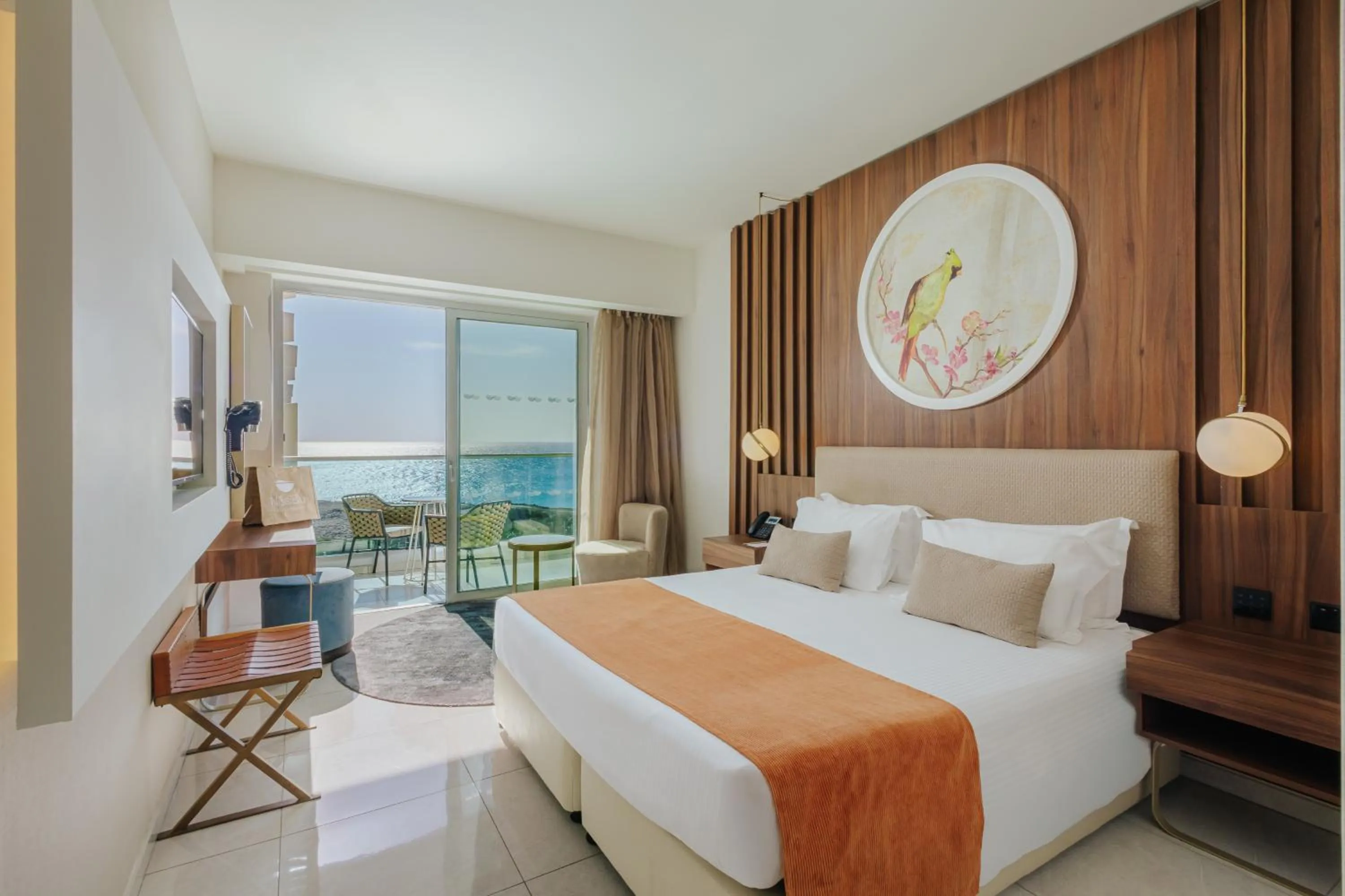 Bed in NissiBlu Beach Resort