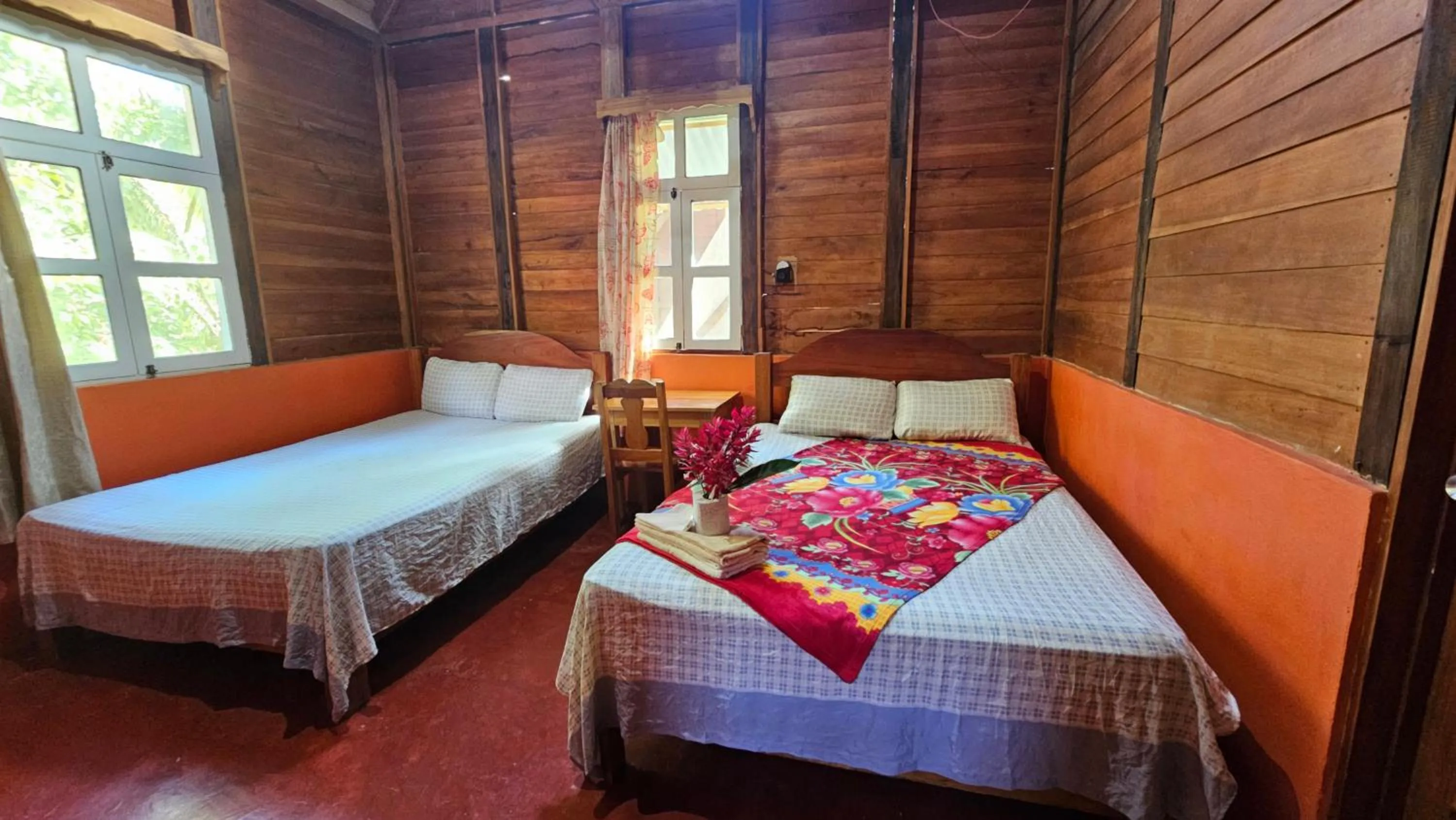 Bed in Cabañas Yax-ha
