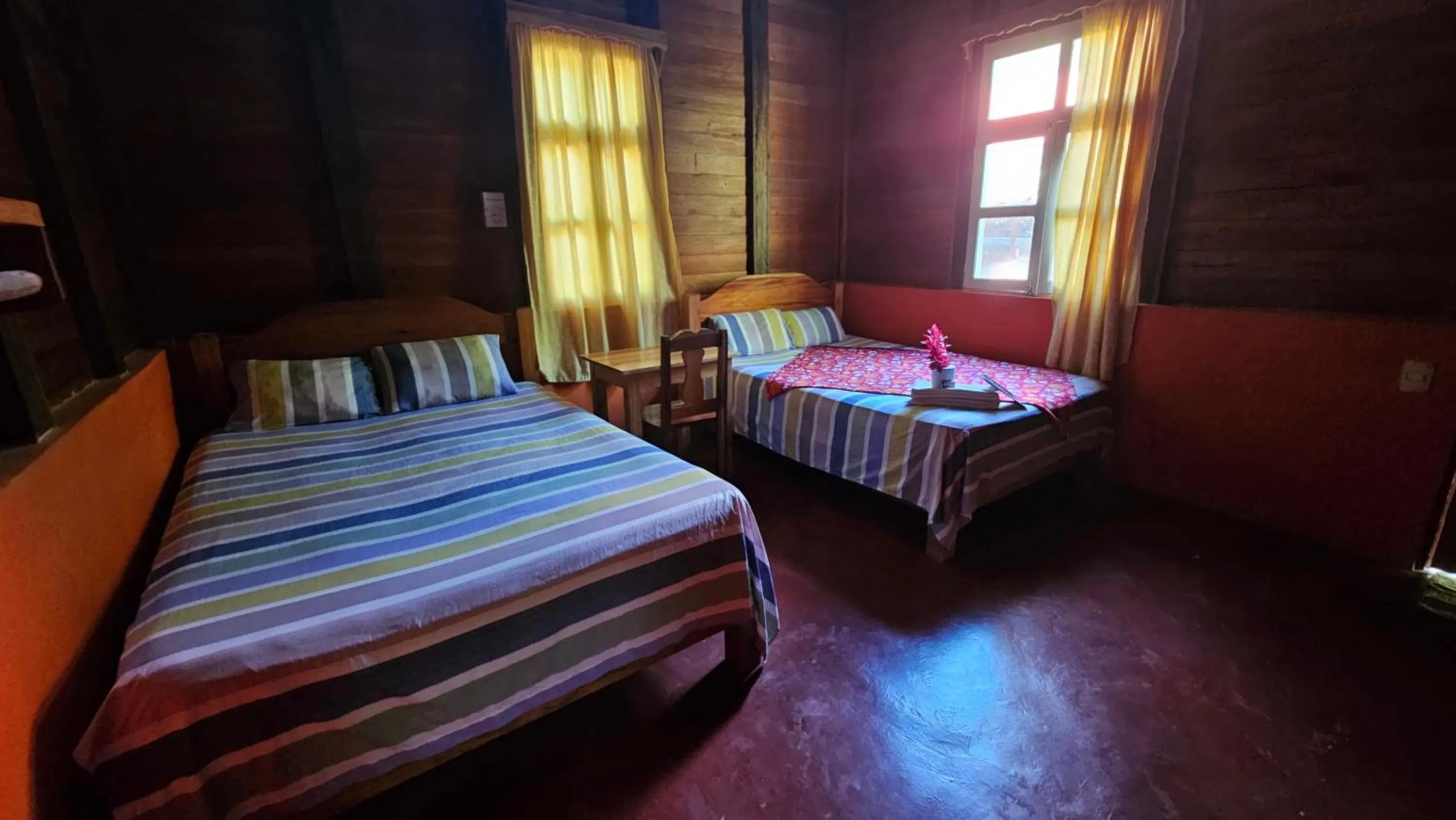 Bed in Cabañas Yax-ha