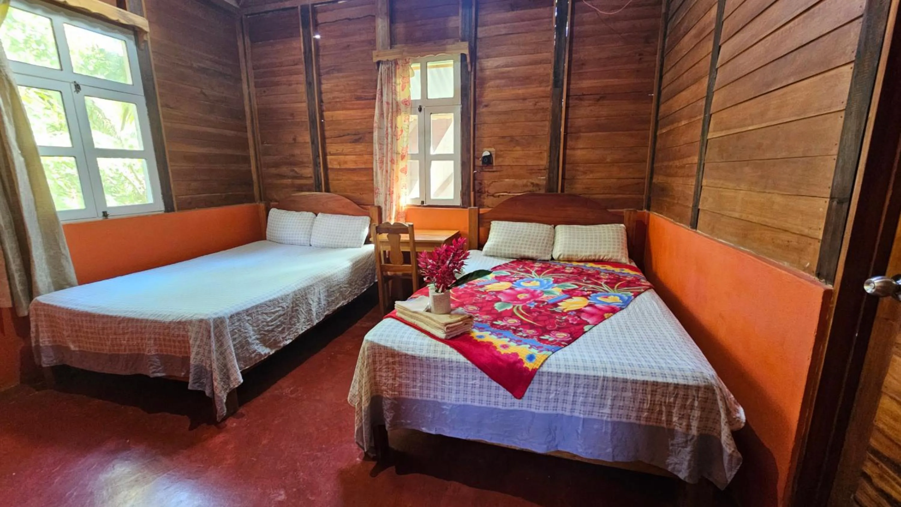 Bed in Cabañas Yax-ha