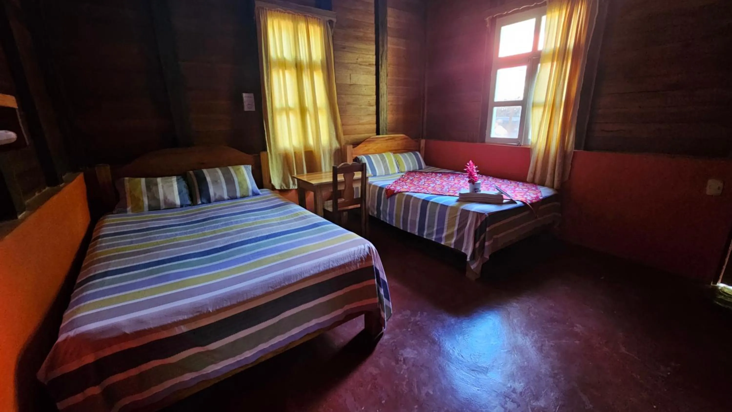 Bed in Cabañas Yax-ha