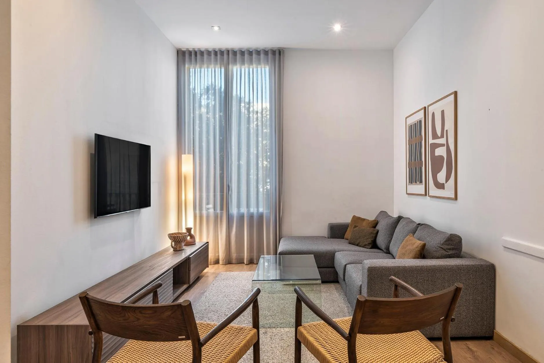 Living room in The Corner Apartments by Aspasios