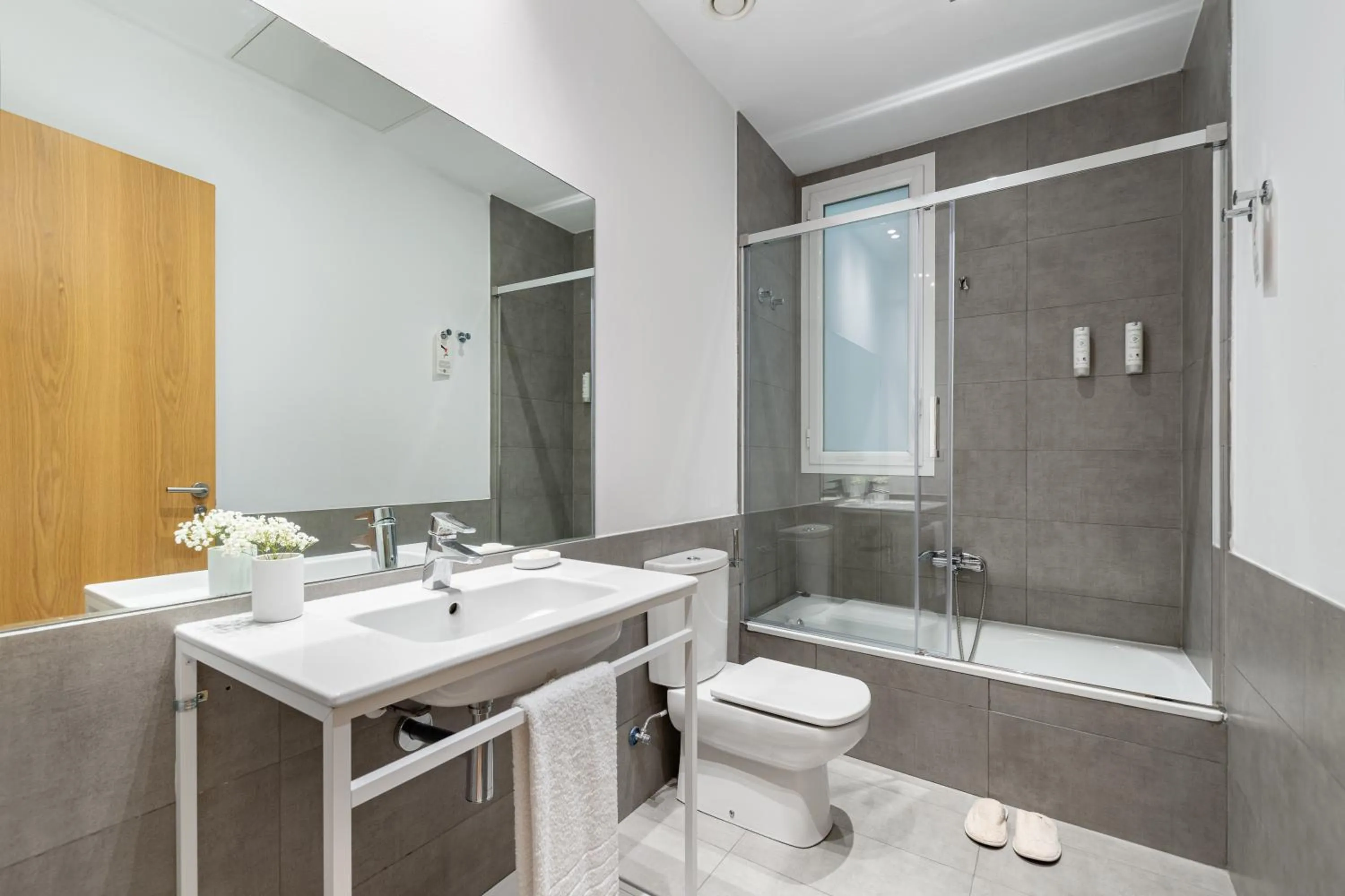 Bathroom in The Corner Apartments by Aspasios