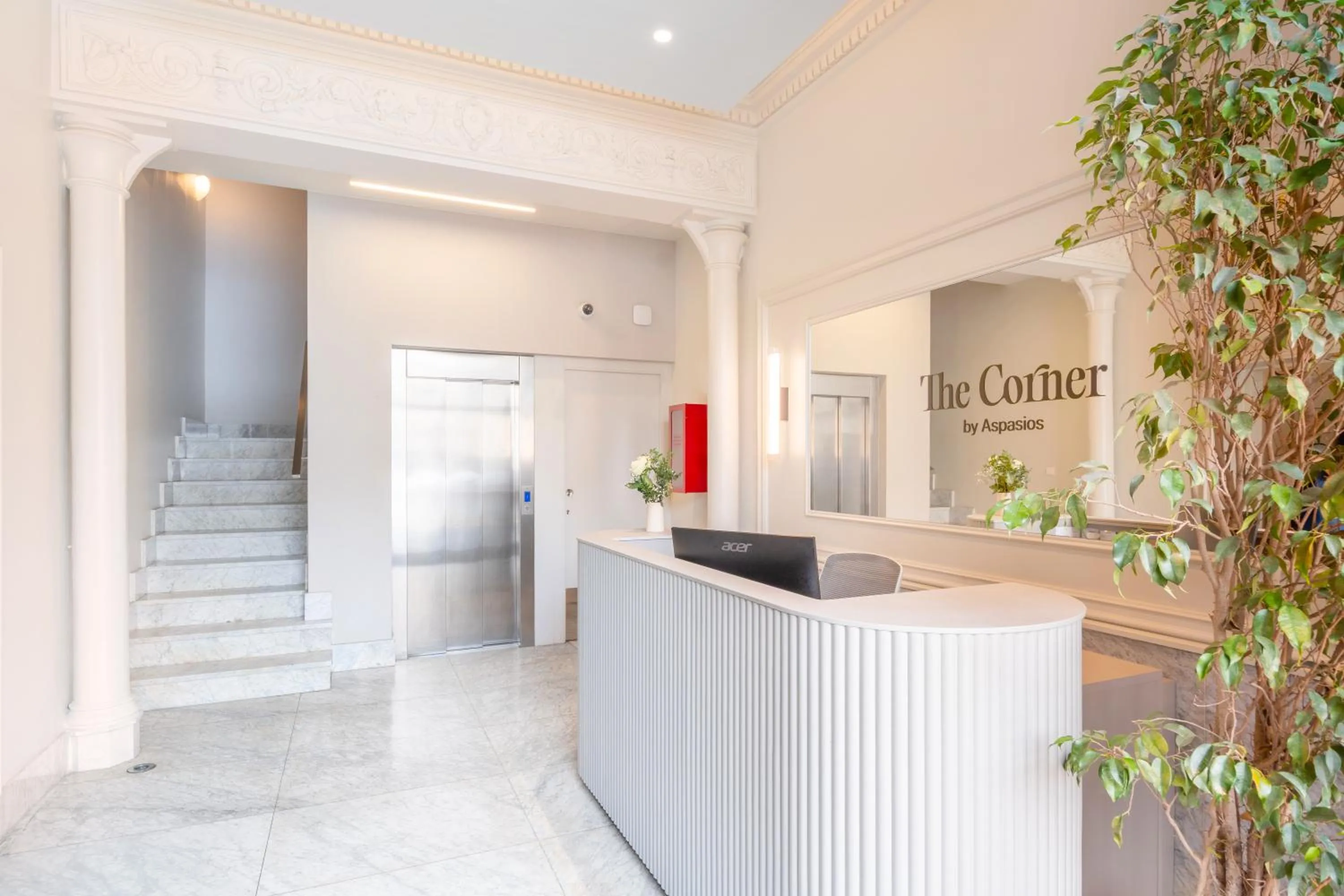 Lobby or reception in The Corner Apartments by Aspasios