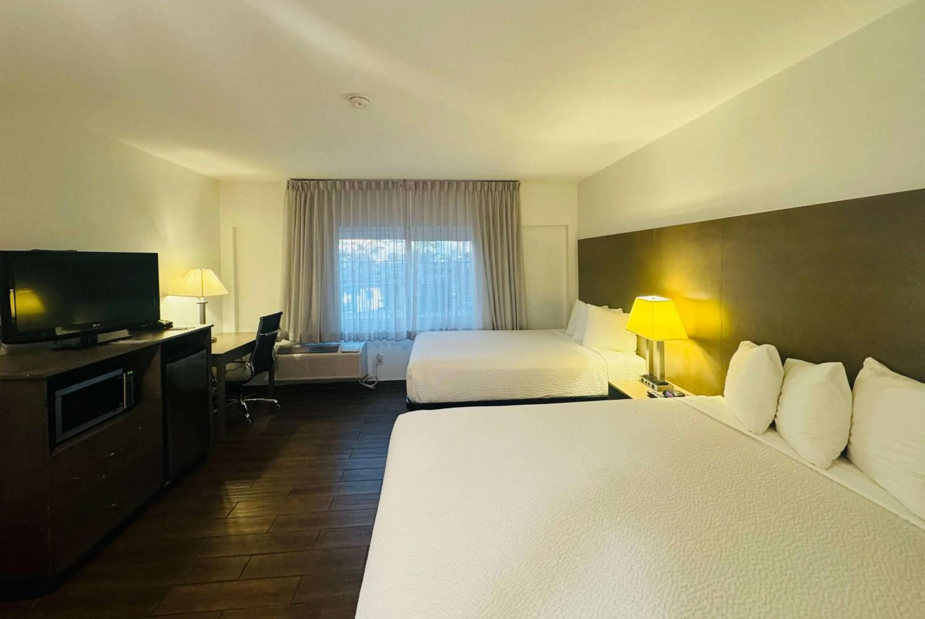 Photo of the whole room, Bed in Ramada by Wyndham San Diego Airport