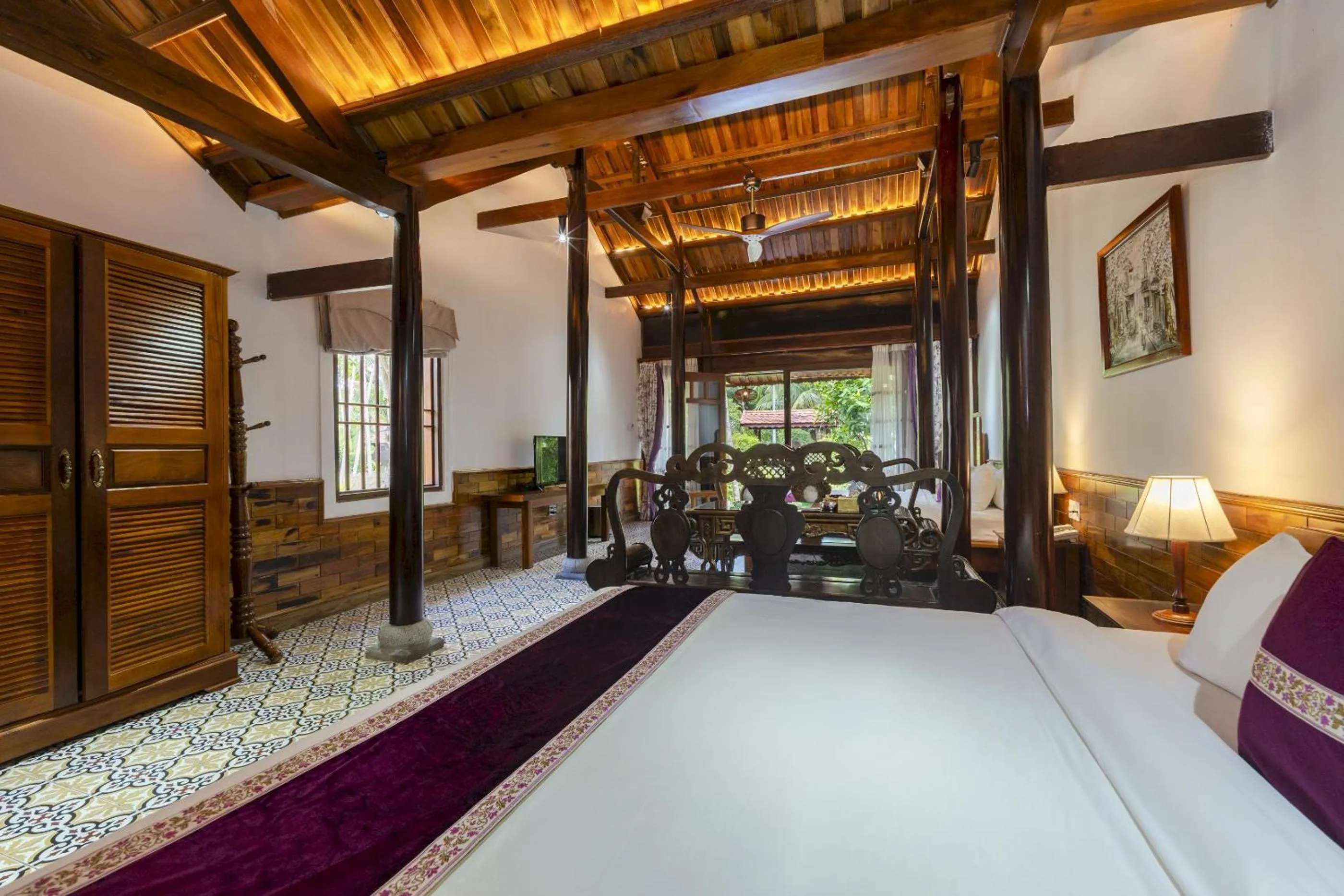 Living room, Bed in Maison Du VietNam Resort & Spa