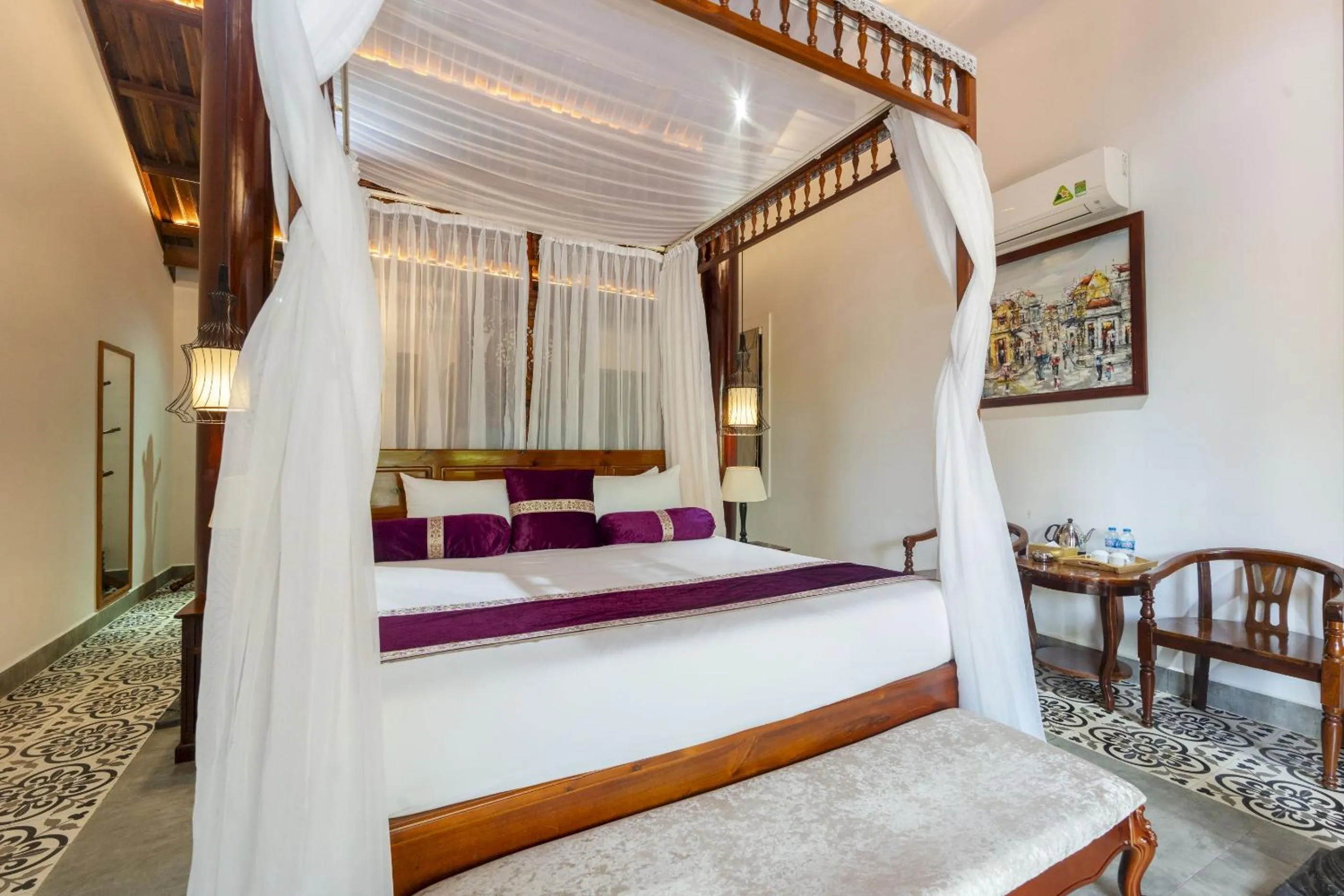 Bed in Maison Du VietNam Resort & Spa