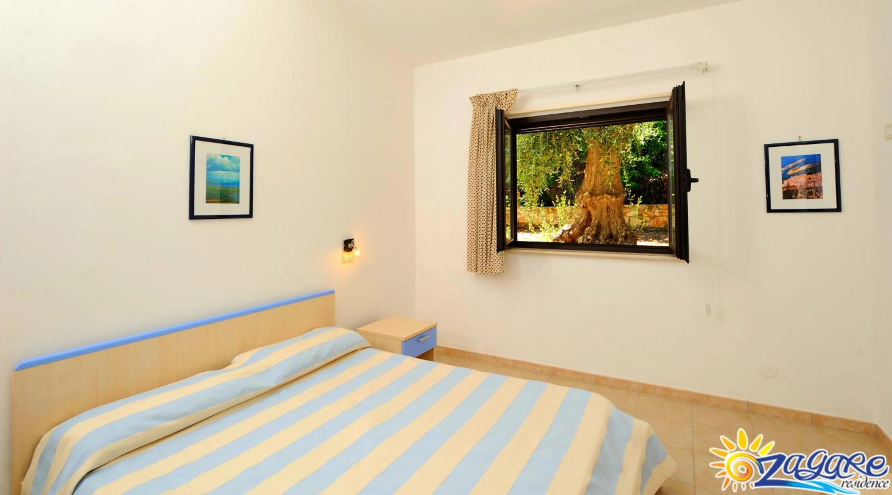 Bed in Zagare Residence