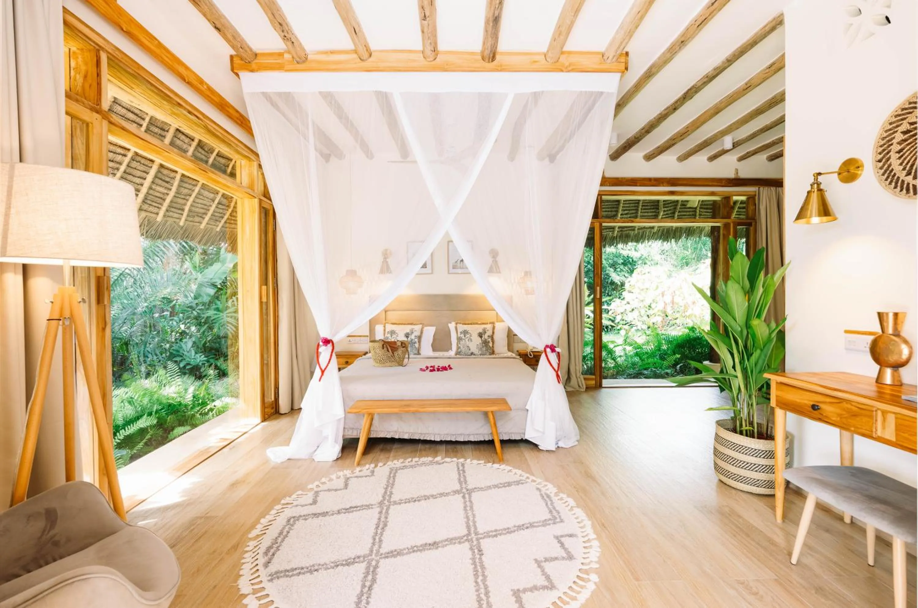 Bed in Zanzi Resort Private Paradise