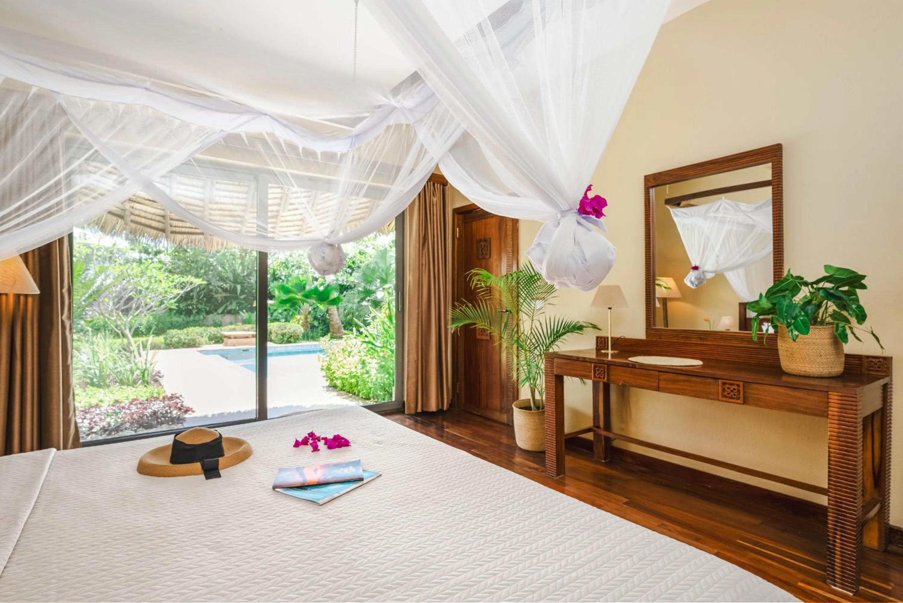 Bed in Zanzi Resort Private Paradise